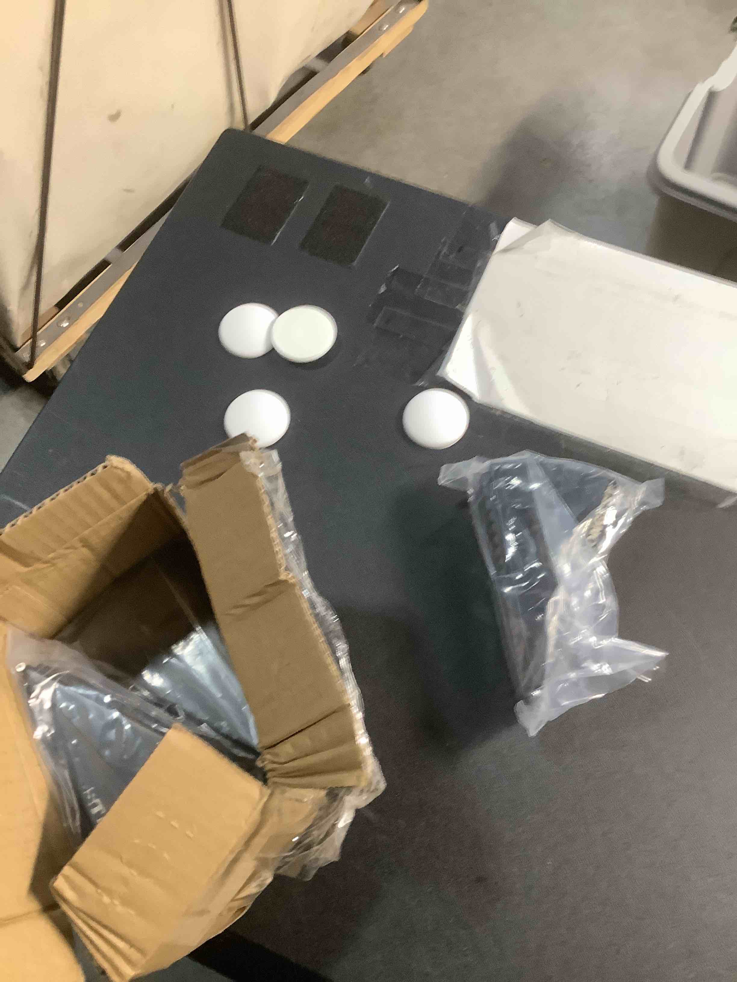 Condition photo showing Good Condition for Strongest Home 4 Pack XL Adjustable Door Stopper with Spring – Heavy Duty Wedge for Oversized, Thick & Heavy Doors, Anti-Slip Rubber Grip, Commercial, Home & Outdoor Use on Carpet, Wood, Tile - Black Spring Black 4 Pack