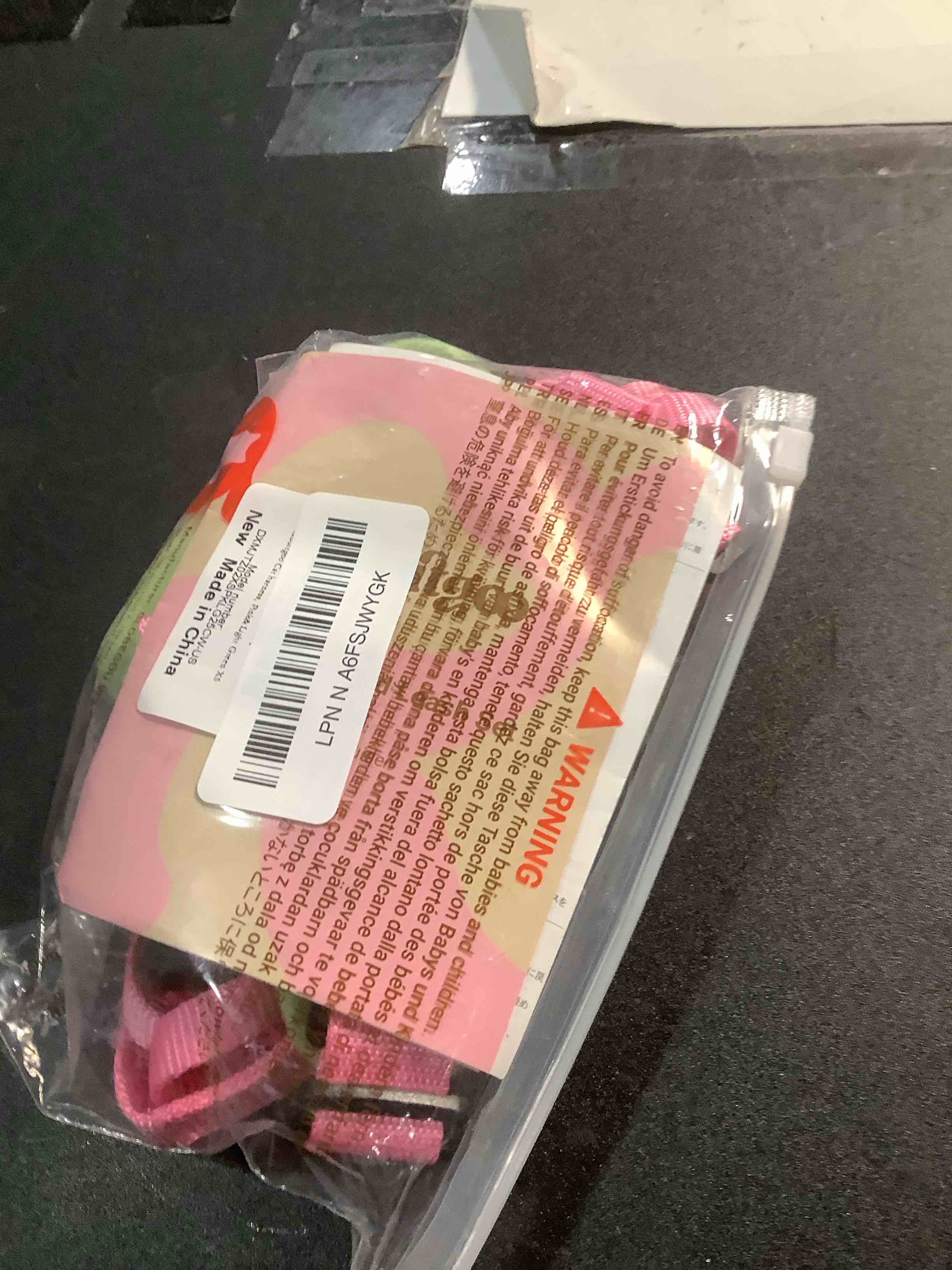 Condition photo showing Good Condition for rabbitgoo Cat Harness and Leash for Walking, Escape Proof Soft Adjustable Vest Harnesses for Cats, Easy Control Breathable Reflective Strips Jacket, Pink&Light Green, XS XS Pink&Light Green