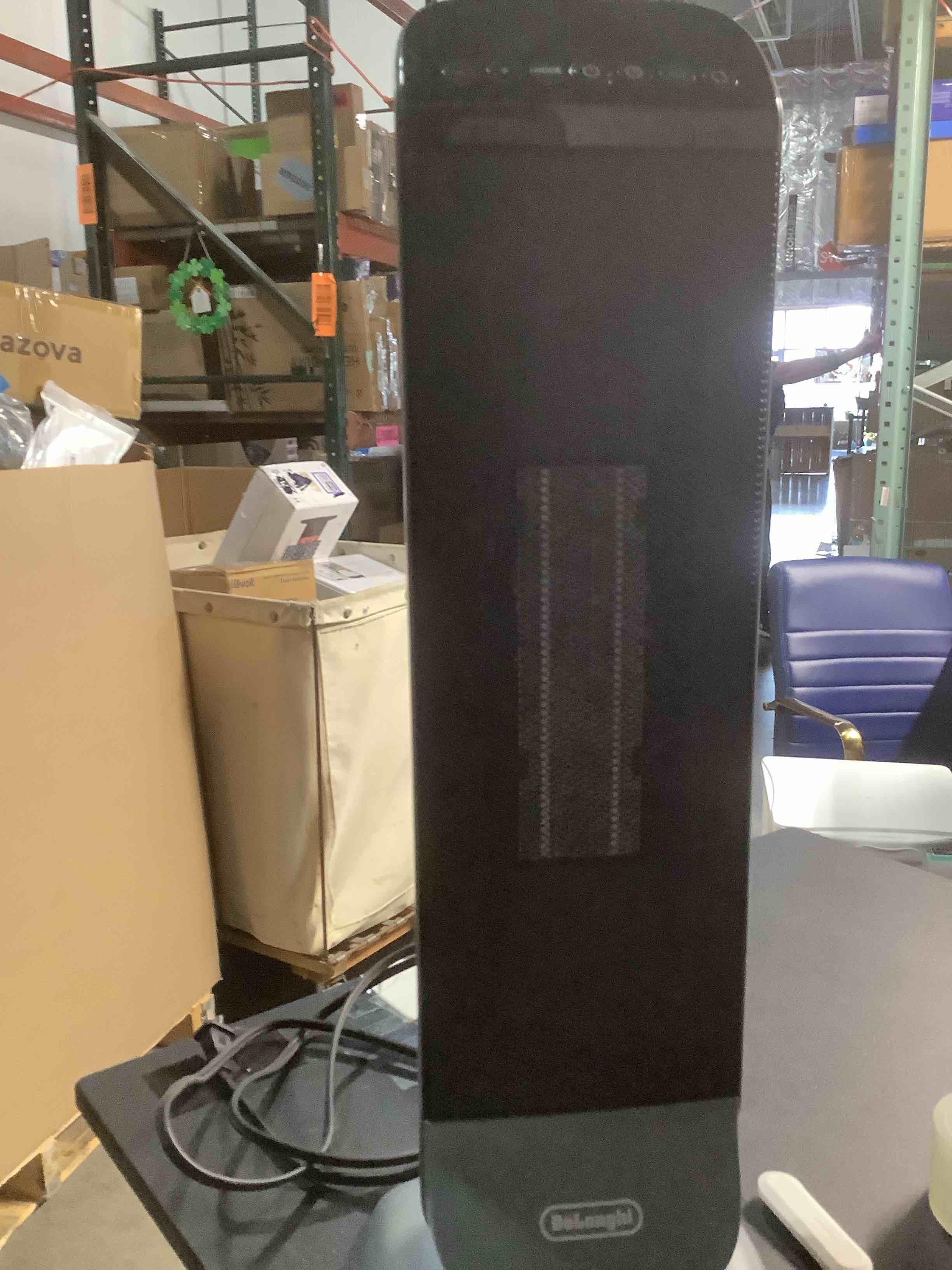 Condition photo showing Good Condition for DeLonghi 1500w Ceramic Digital Tower Heater made with recycled materials and packaging, remote, ECO, oscillation