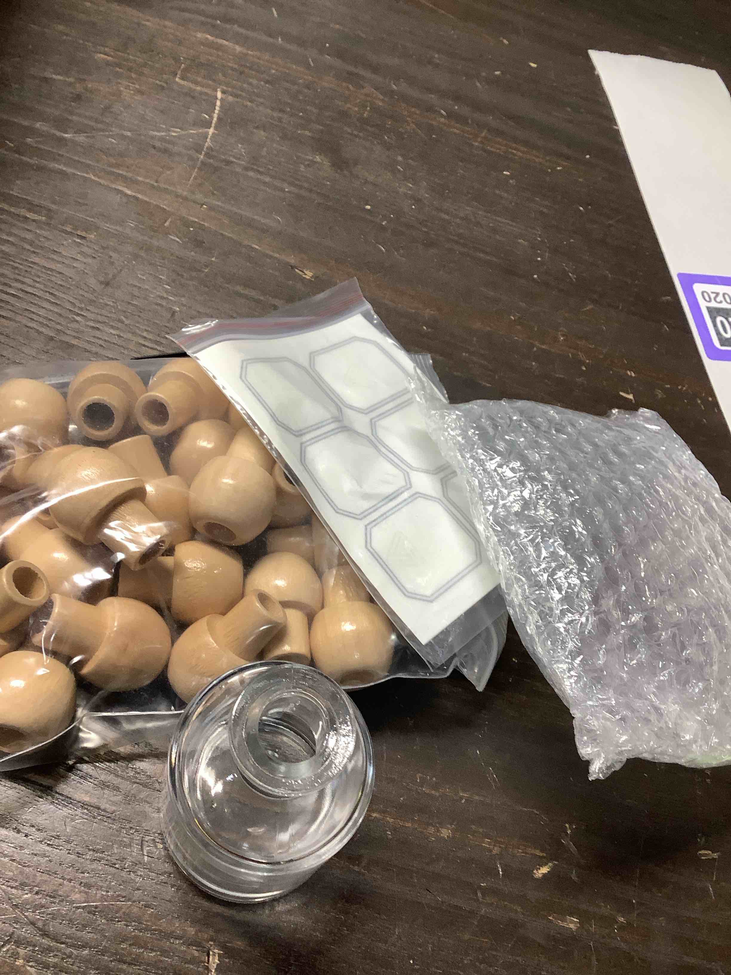 Condition photo showing Good Condition for Hushee 24 Pcs Shot Glasses Patron Bottles with Cork Straw 1. 7 oz Mini Empty Tequila Bottles for Drinks Small Reusable Clear Glass Patron Shot Cups with Silk Ribbon Wedding Party Favors (50ml) 1.7oz Green 24