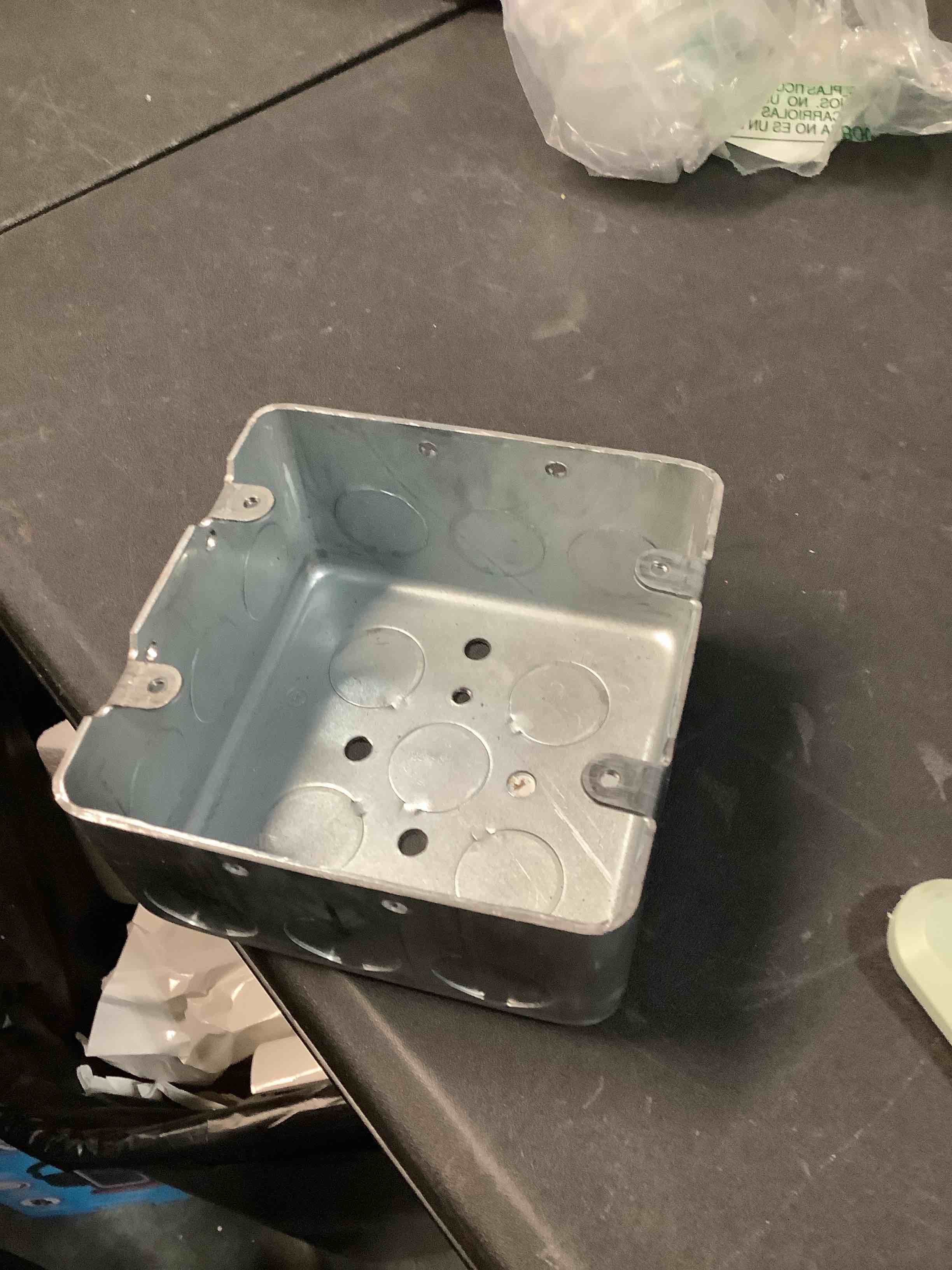 Condition photo showing Good Condition for raco hubbell 680 2-device, 2-1/8-inch deep, 1/2-inch side knockouts 4-inch square switch box, drawn, silver,gray