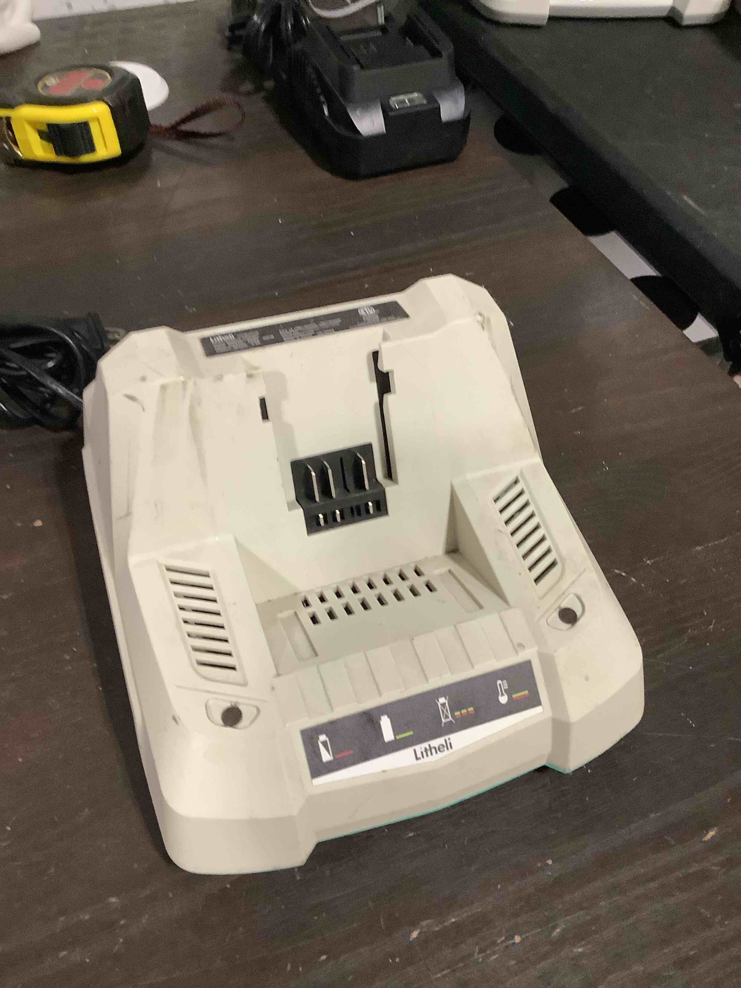 Condition photo showing As Is for charger only** litheli 40v polesaw cordless, 10 inch battery pole saws for tree trimming, electric pole chainsaw with 2.5ah battery & charger, oiling system, 8.3 lb lightweight, 16 ft/s cutting speed power pole saw