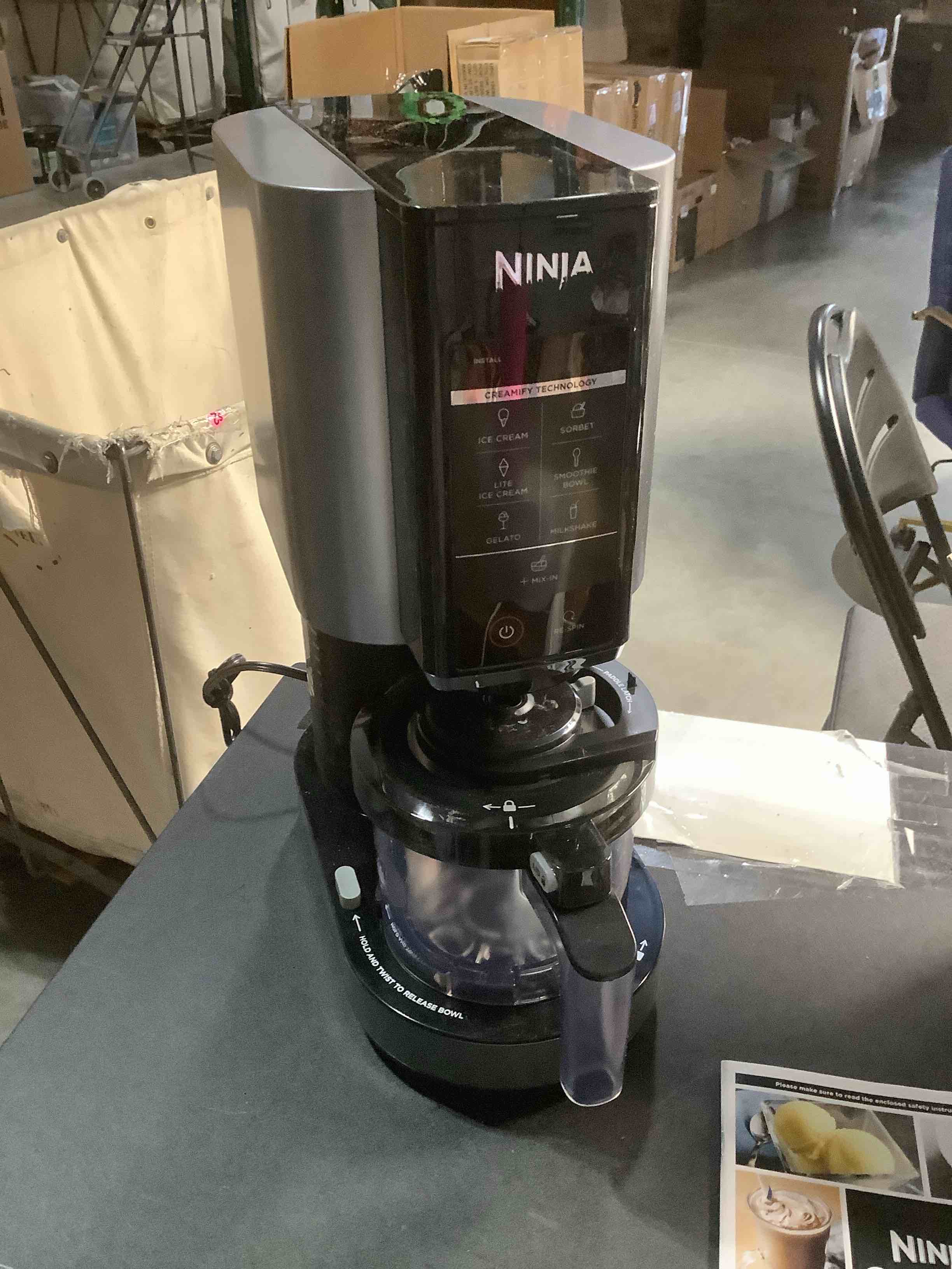 Condition photo showing Good Condition for Ninja NC301 CREAMi Ice Cream Maker, for Gelato, Mix-ins, Milkshakes, Sorbet, Smoothie Bowls & More, 7 One-Touch Programs, with (2) Pint Containers & Lids, Compact Size, Perfect for Kids, Silver
