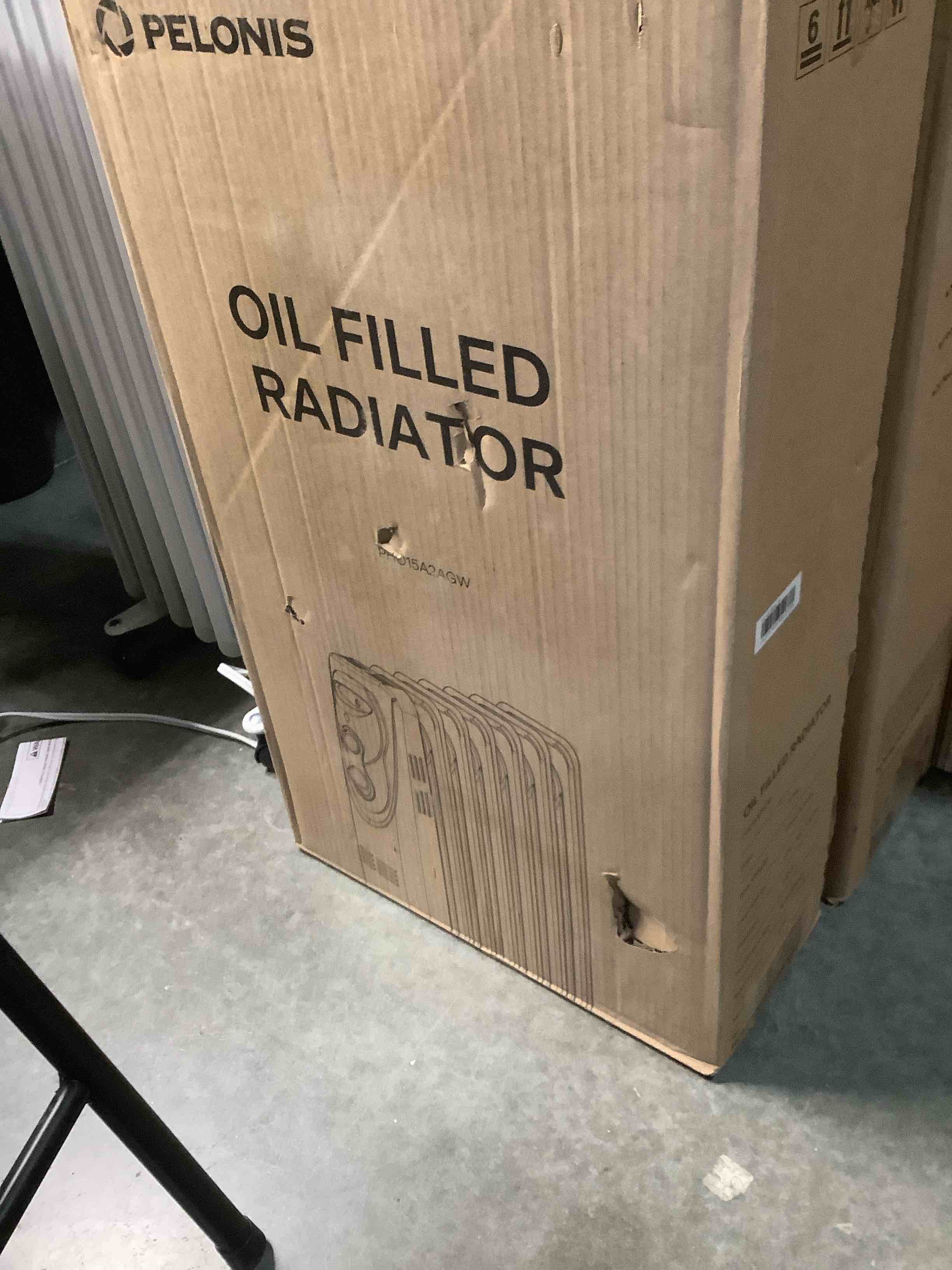 Condition photo showing Good Condition for pelonis radiator heater for large space, electric oil filled radiator, dual knobs, 1500w, quiet space heater, 3 modes, tip-over protection classic white