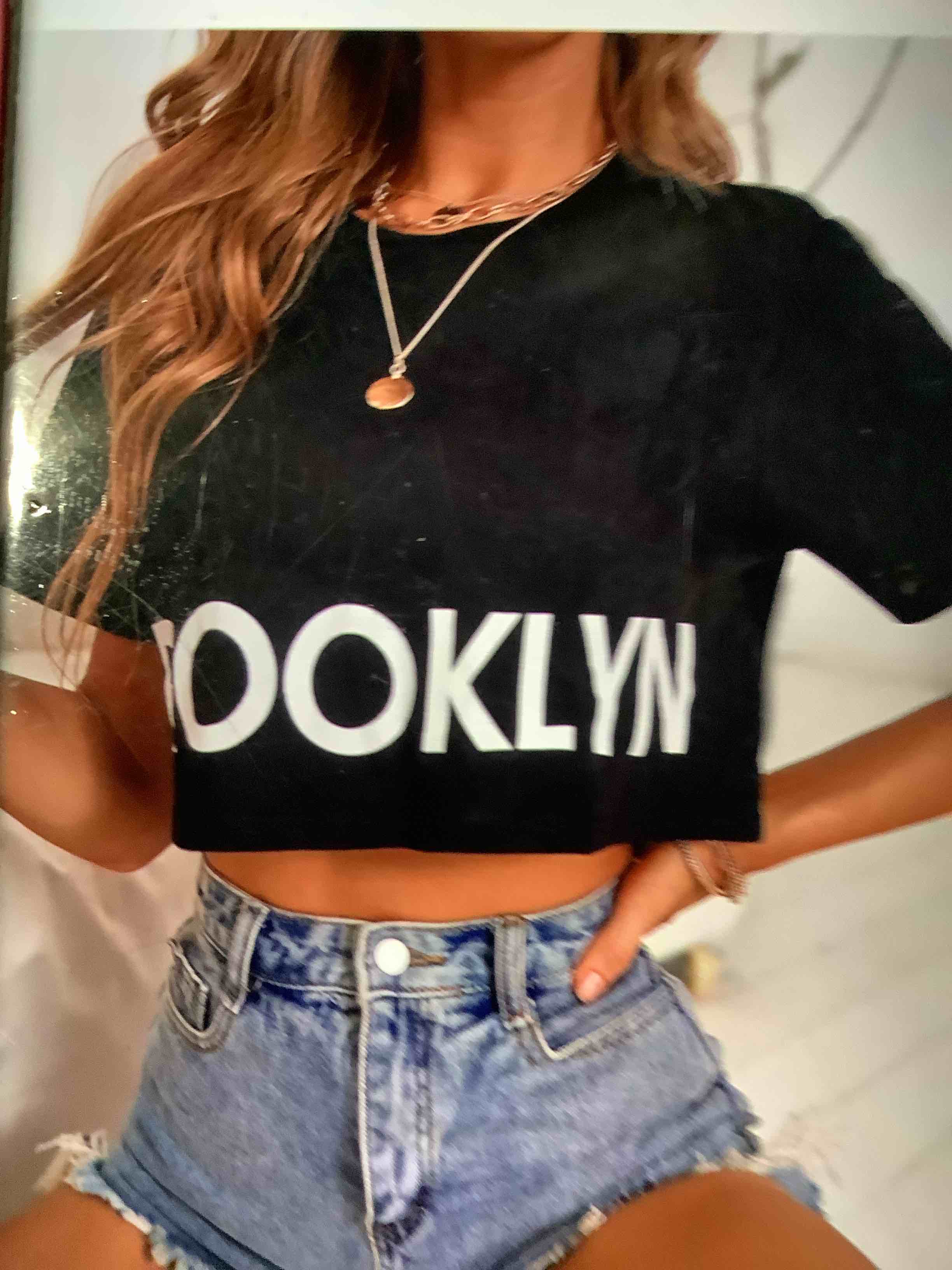 Condition photo showing Good Condition for  similar product it does have the word brooklyn written across the front **tankaneo women crop t-shirts half sleeve drop shoulder cropped tops y2k casual summer basic tees