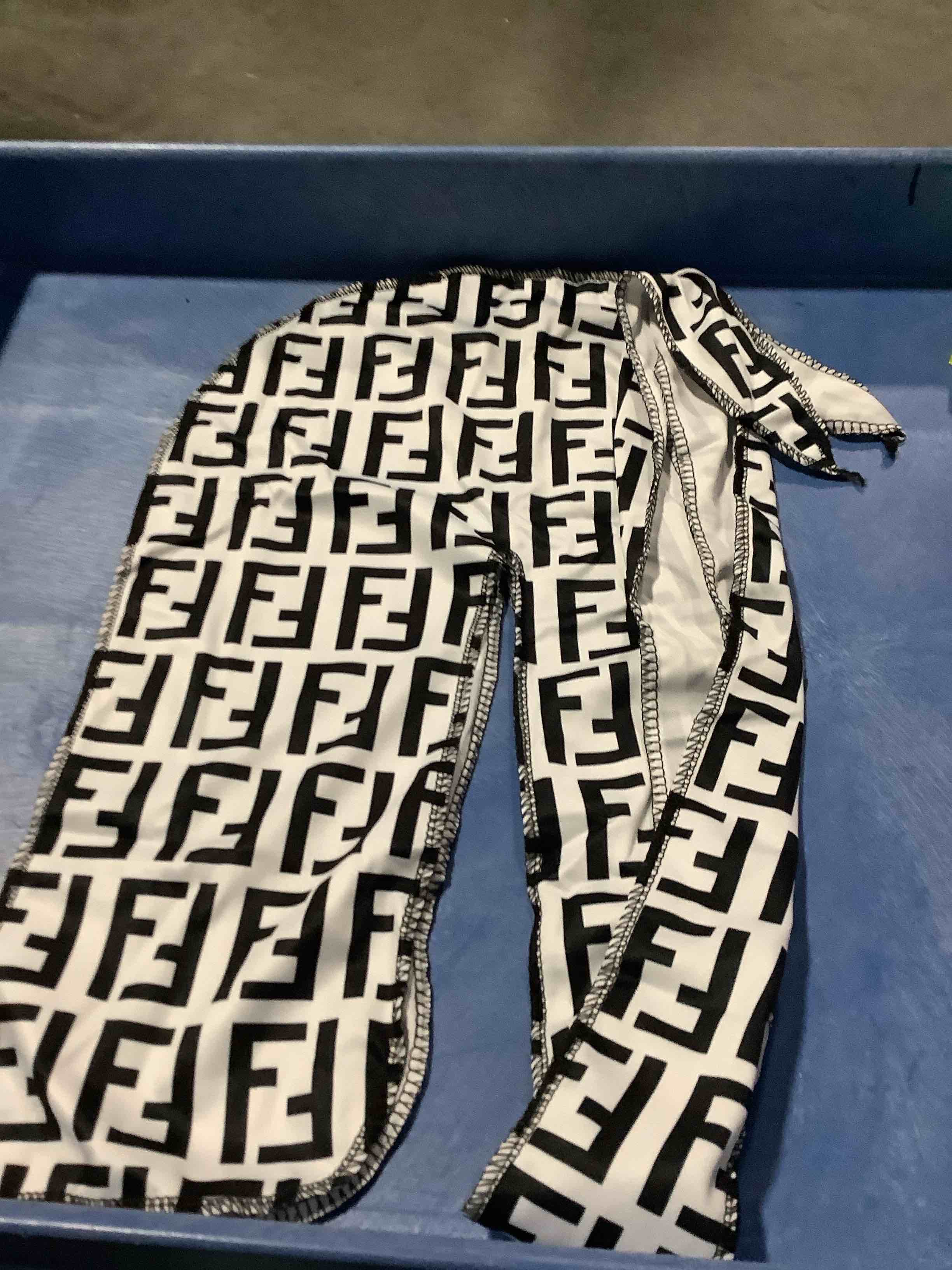 Condition photo showing New/Like New for ****not authentic*** designer inspired ff monogram do rag head ramp black-and-white stretch wave cap