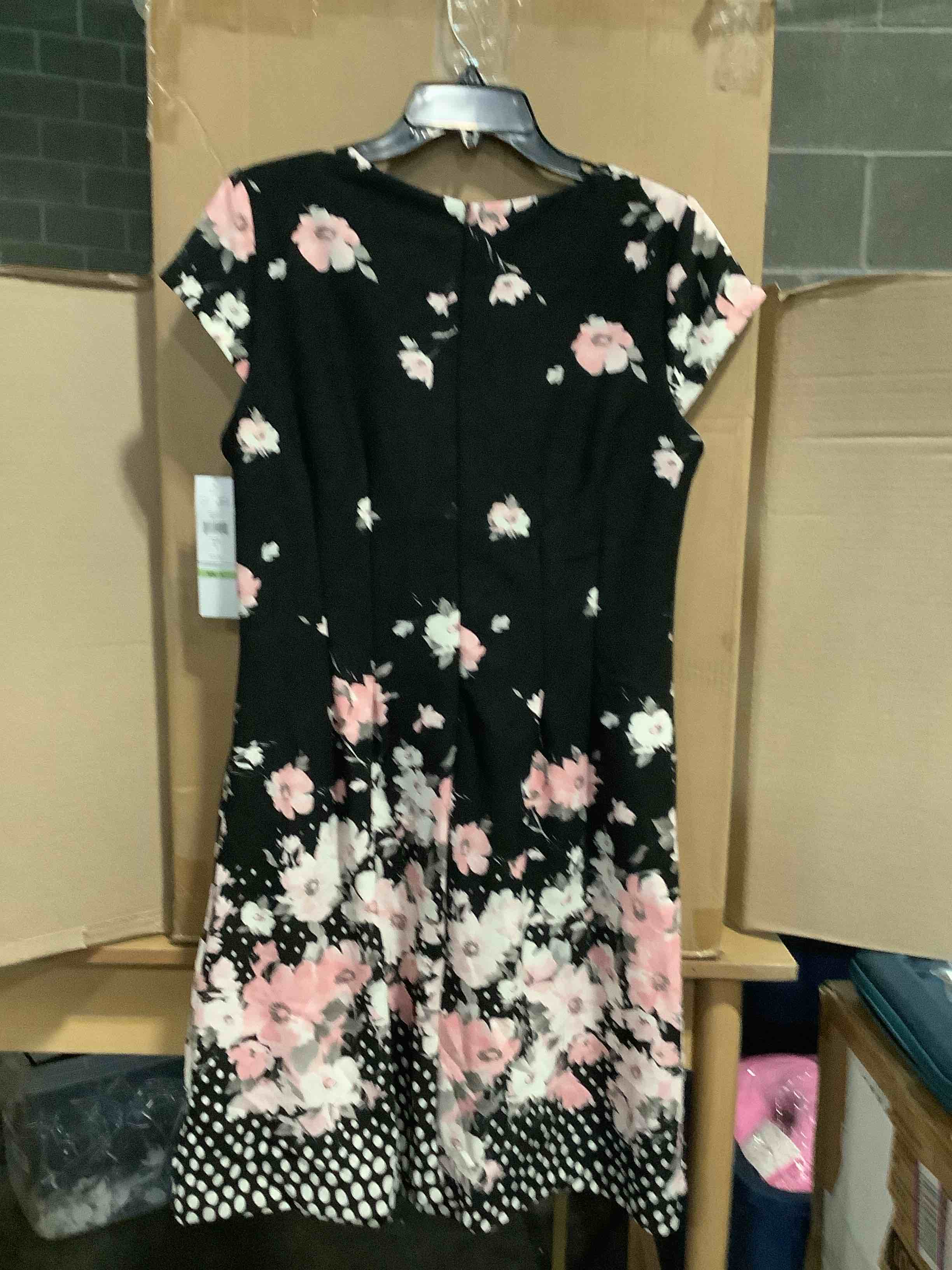 Condition photo showing New/Like New for r&m, richard women’s floral shift dress size 8 black pink white short sleeve new tag