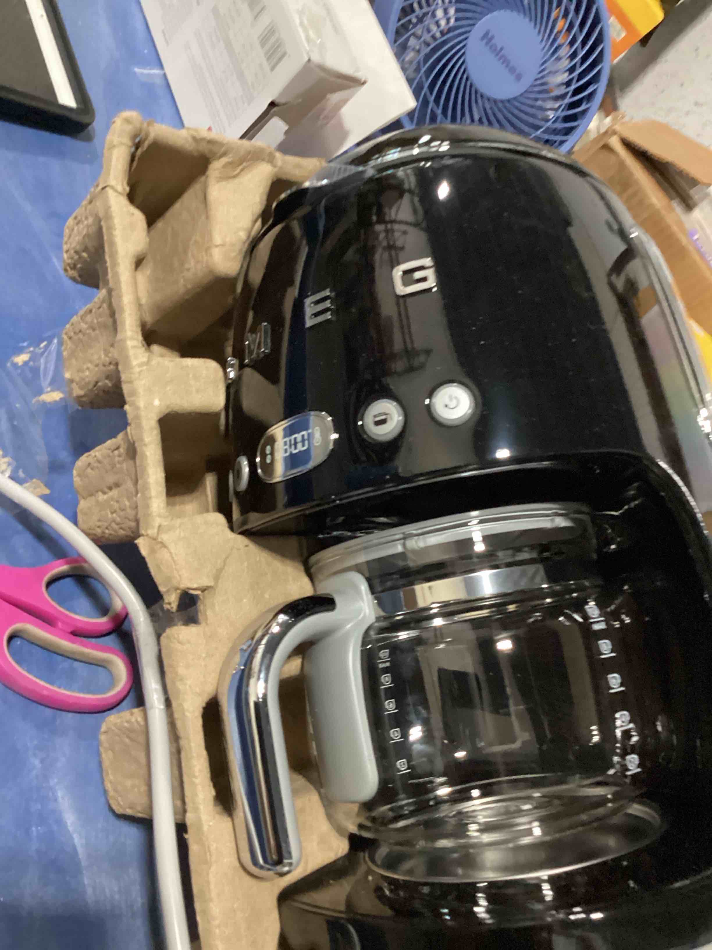Condition photo showing As Is for smeg 50's retro style aesthetic drip coffee machine with 10 cup glass carafe, auto start feature, keep warm plate, and two coffee strength settings (cream) 10 cup cream