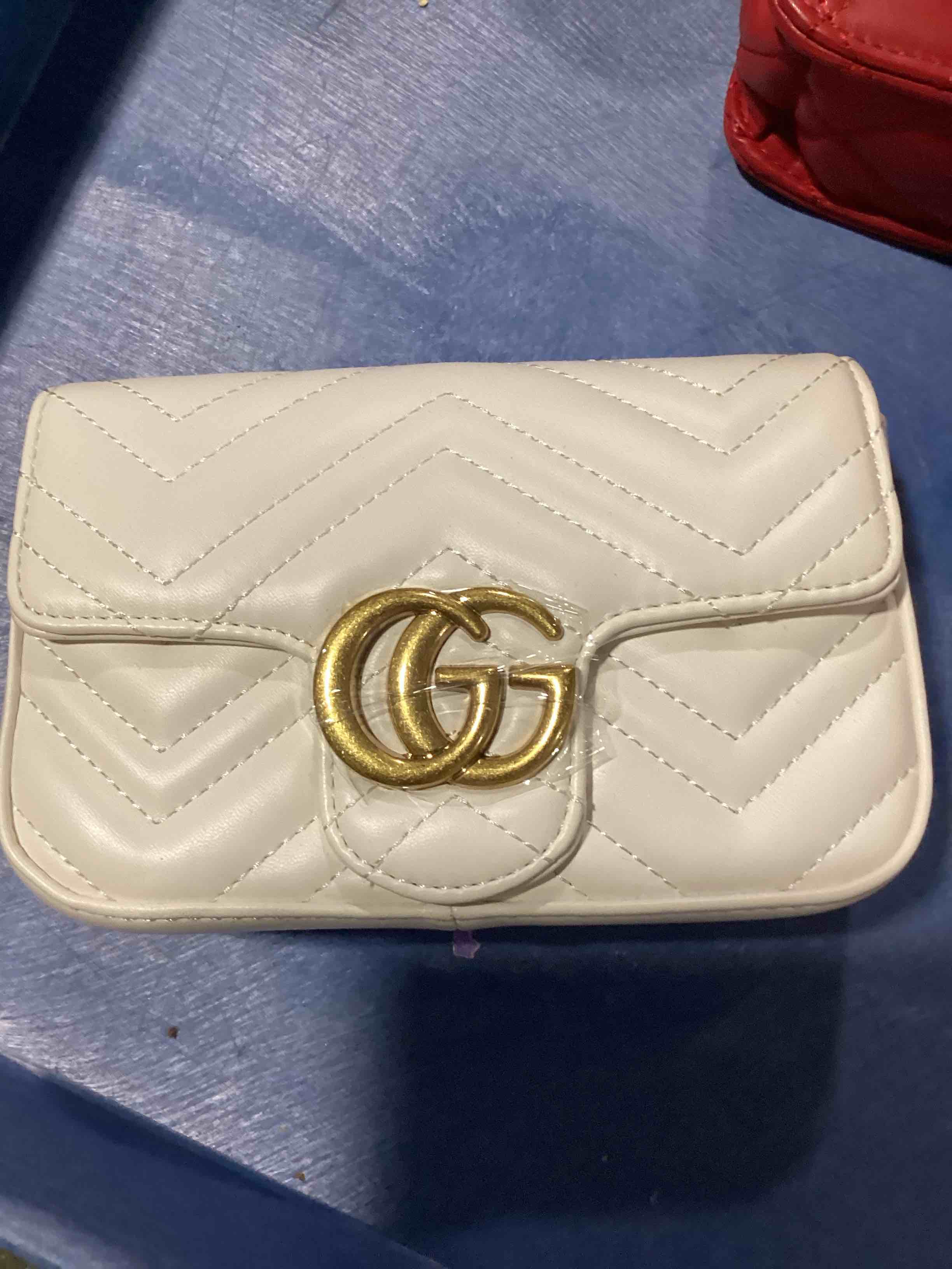 Condition photo showing New/Like New for not authentic replica designer purse