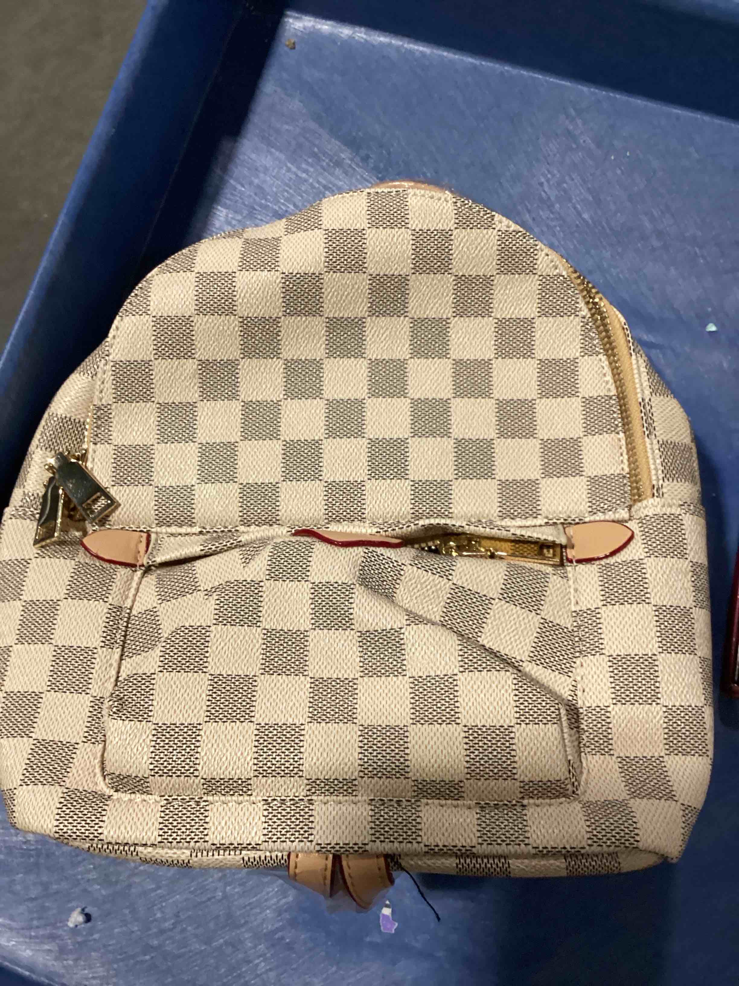 Condition photo showing New/Like New for mini checkered fashion, backpack purse, beige and gray plaid pattern, gold tone, hardware