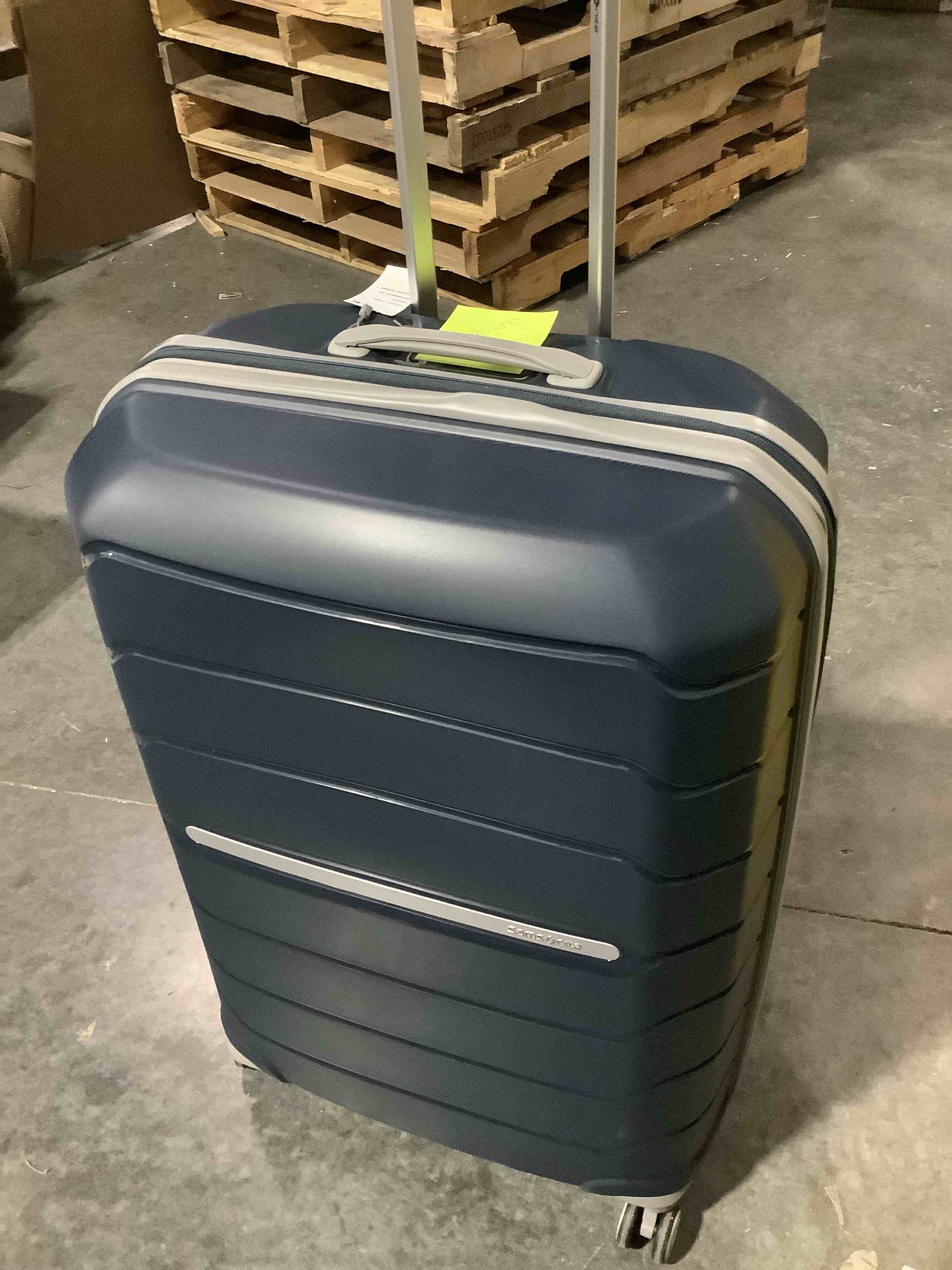 Condition photo showing New/Like New for samsonite freeform 28-inch large luggage with dual 360° spinner wheels - checked suitcase - tsa lock, airline-approved - lightweight durable polypropylene expandable hardshell - navy checked-large spinner navy