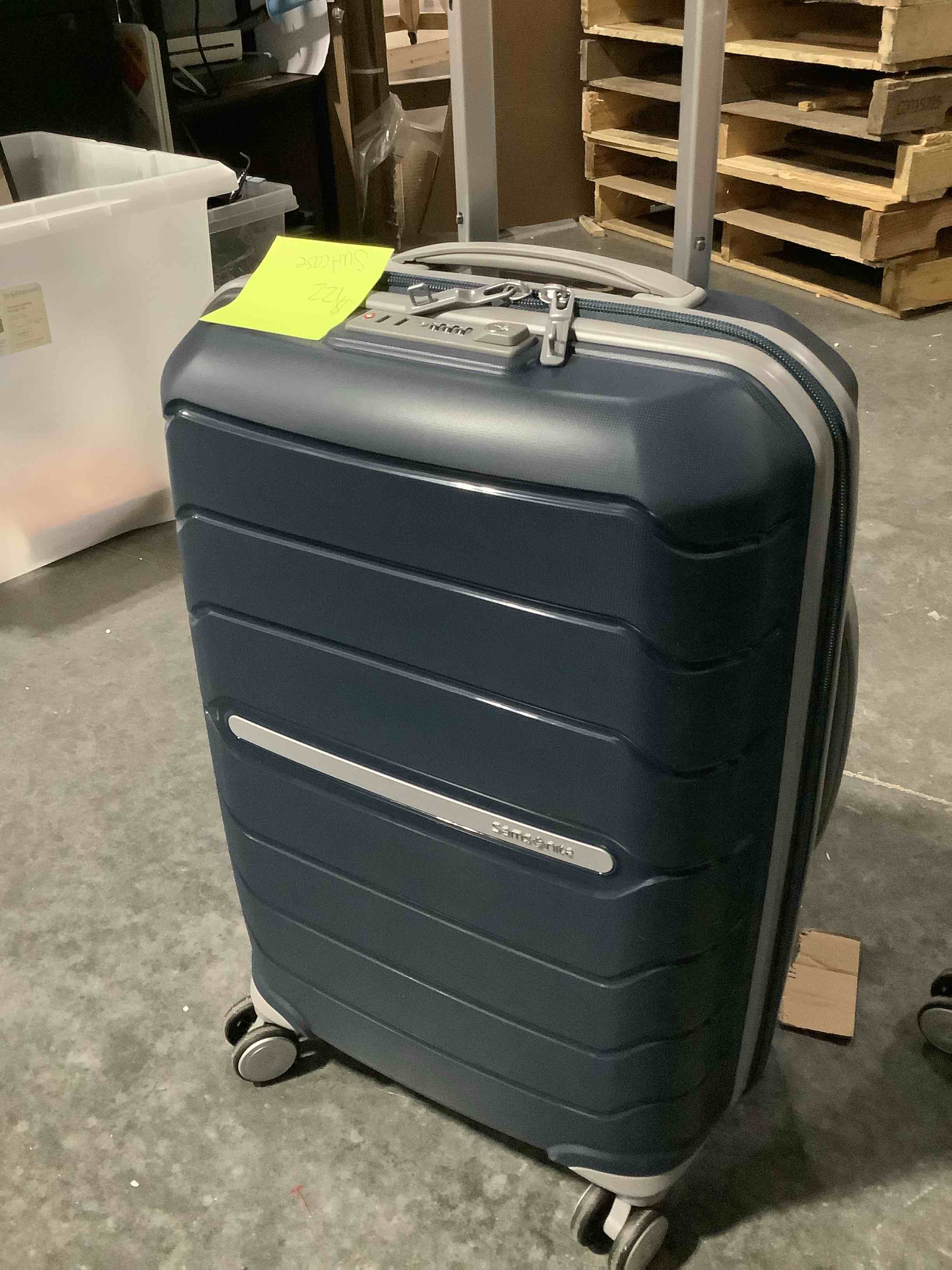 Condition photo showing New/Like New for samsonite freeform hardside carry-on luggage with spinner wheels - hardshell suitcase - tsa, airline-approved - expandable hard shell, smooth rolling wheels for lightweight travel - navy carry-on spinner navy