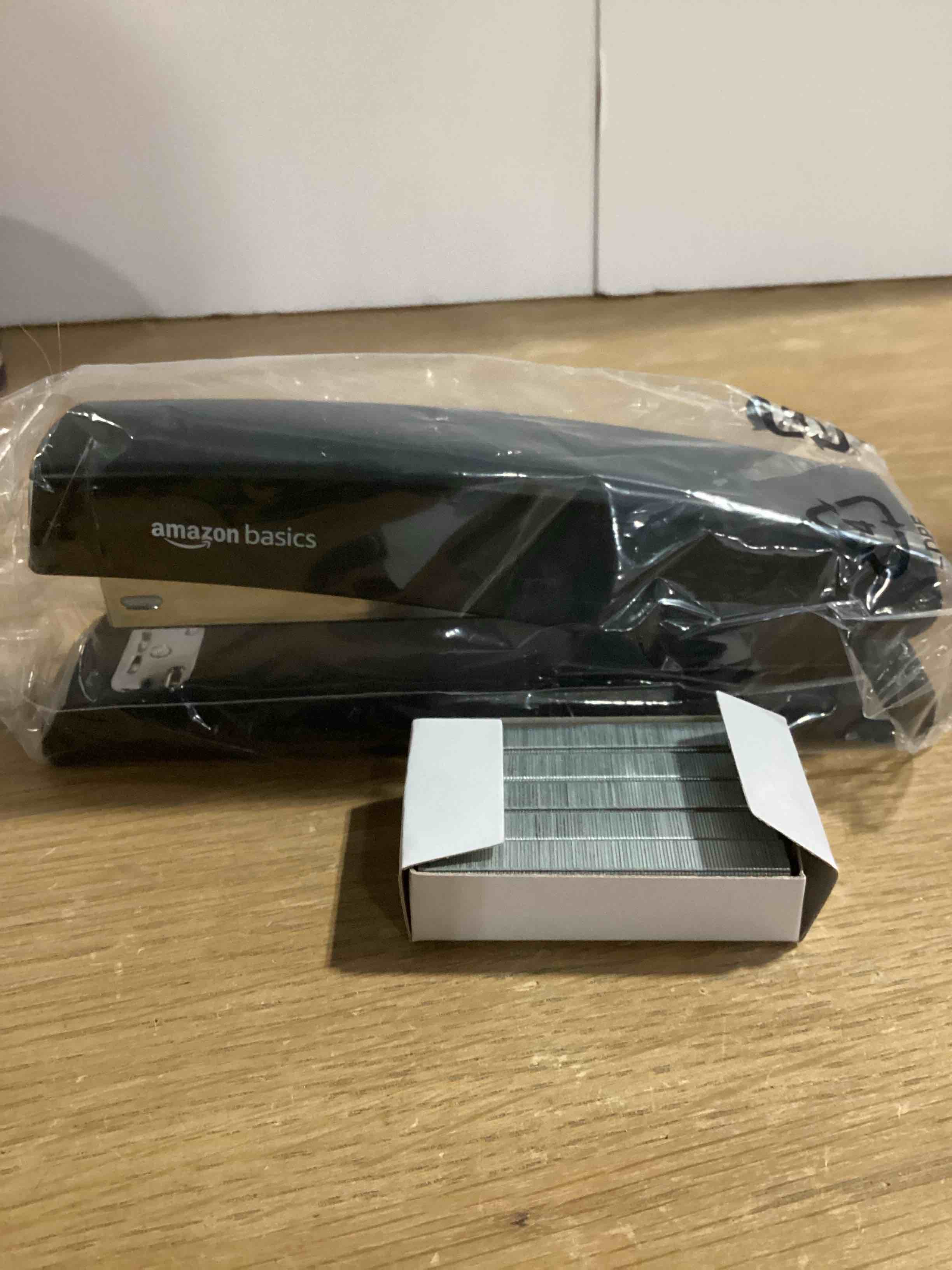 Condition photo showing New/Like New for amazon basics office stapler with 1000 staples, 25 sheet capacity, non-slip, black, home office 1-pack stapler and 1000 staples
