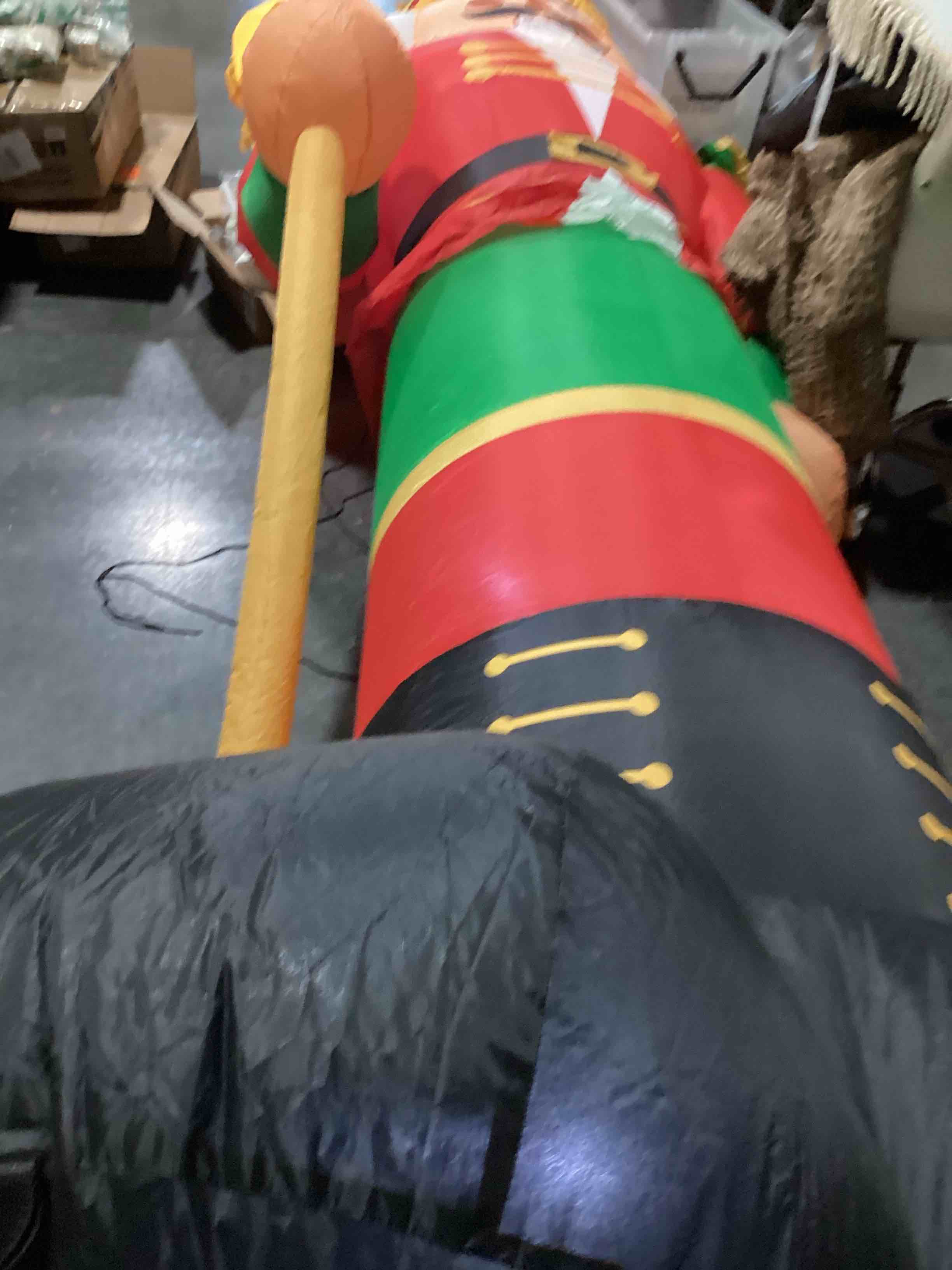Condition photo showing Good Condition for 12 ft inflatable nutcracker 