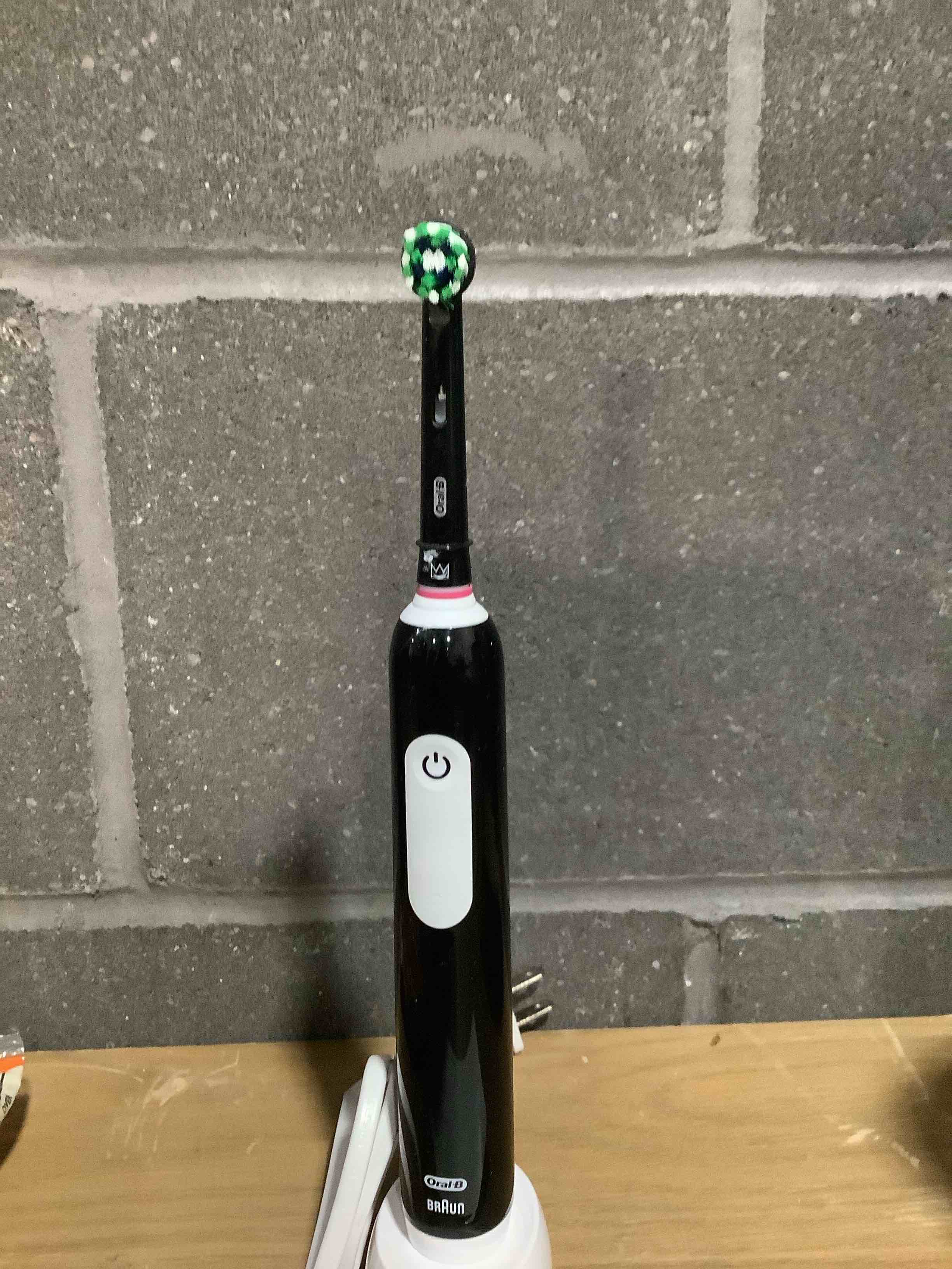 Condition photo showing Good Condition for Oral-B Pro 1000 Rechargeable Electric Toothbrush, Black