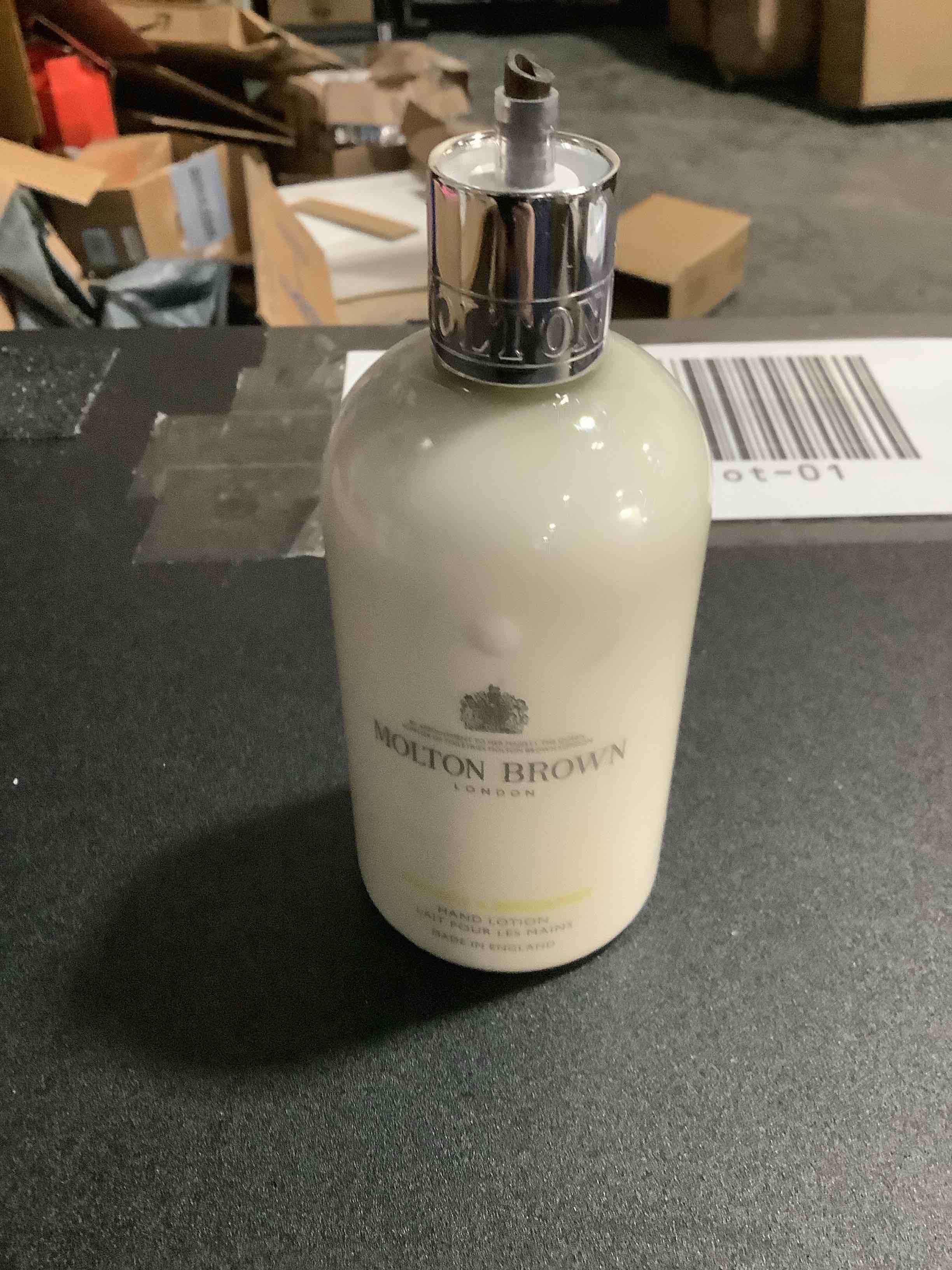 Condition photo showing As Is for Molton Brown Orange & Bergamot Hand Lotion 10 fl. oz.