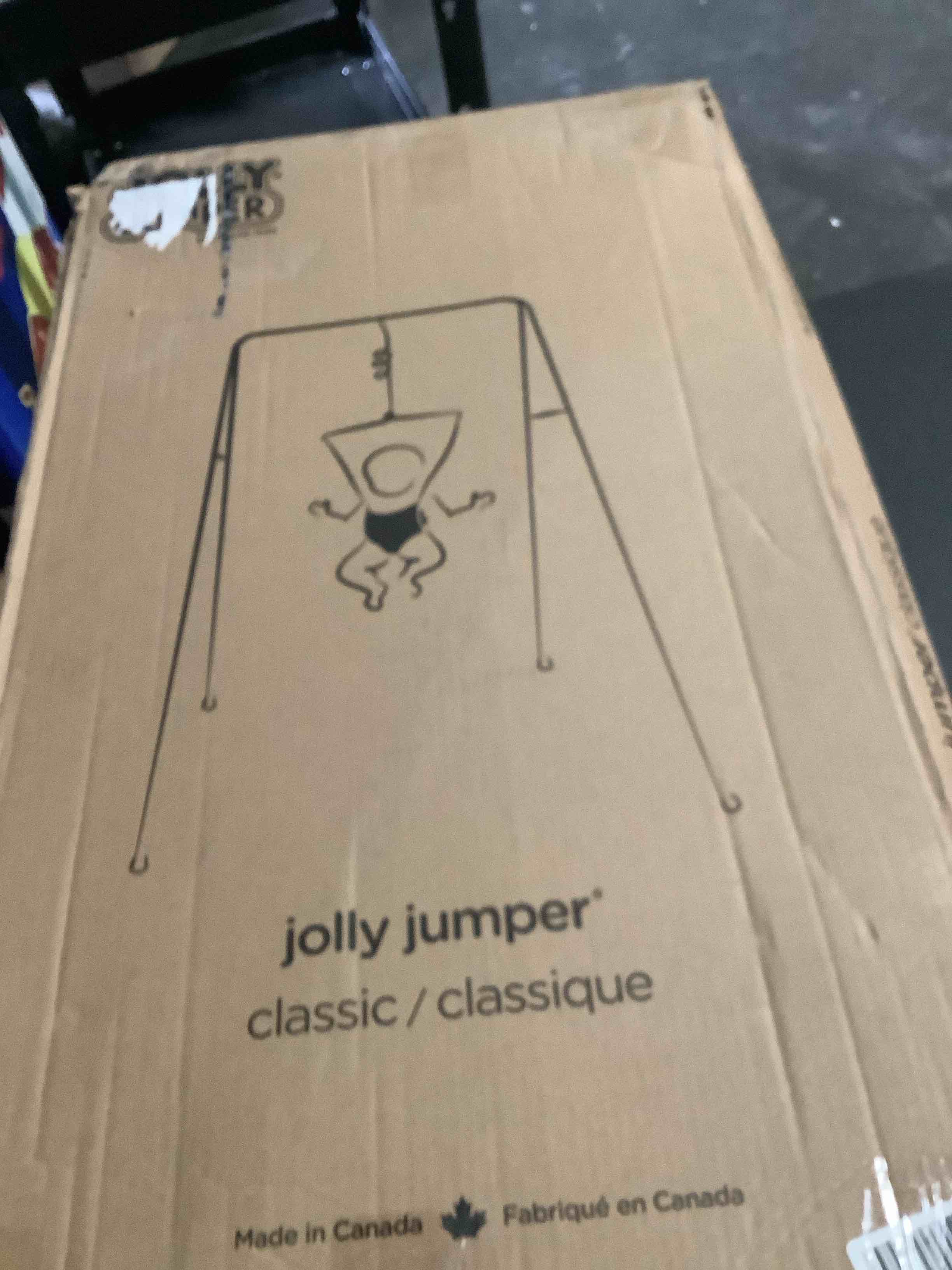 Condition photo showing As Is for Jolly Jumper *Classic* with Stand - The Original Baby Exerciser and Your Alternative to Activity Centers and Baby Bouncers. Trusted by Parents, Loved by Babies for Over 75 Years.