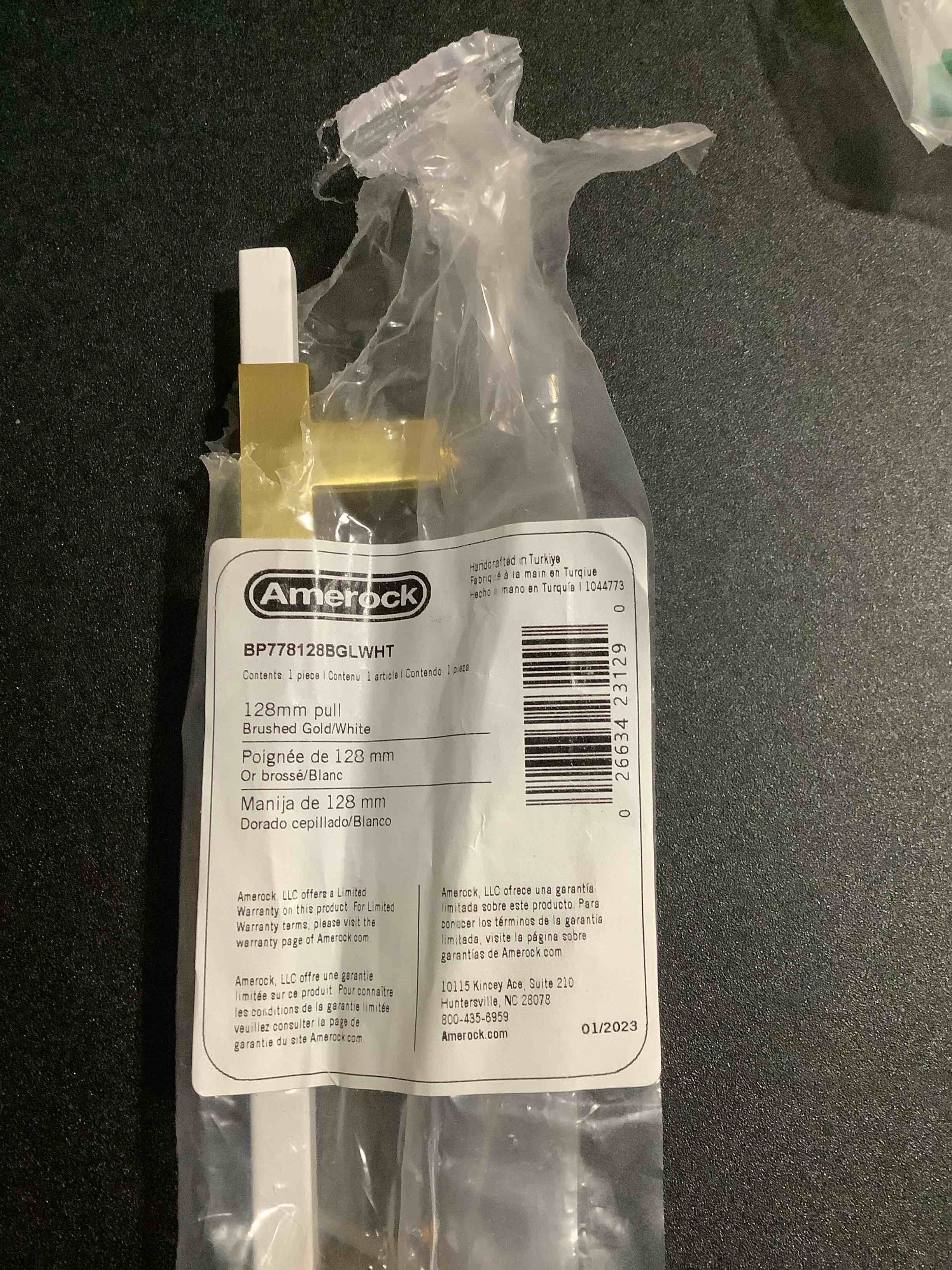 Condition photo showing Good Condition for SIMILAR TO** Amerock | Cabinet Pull | Brushed Gold/White | 10-1/16 inch (256 mm) Center to Center | Urbanite | 1 Pack | Drawer Pull | Drawer Handle | Cabinet Hardware