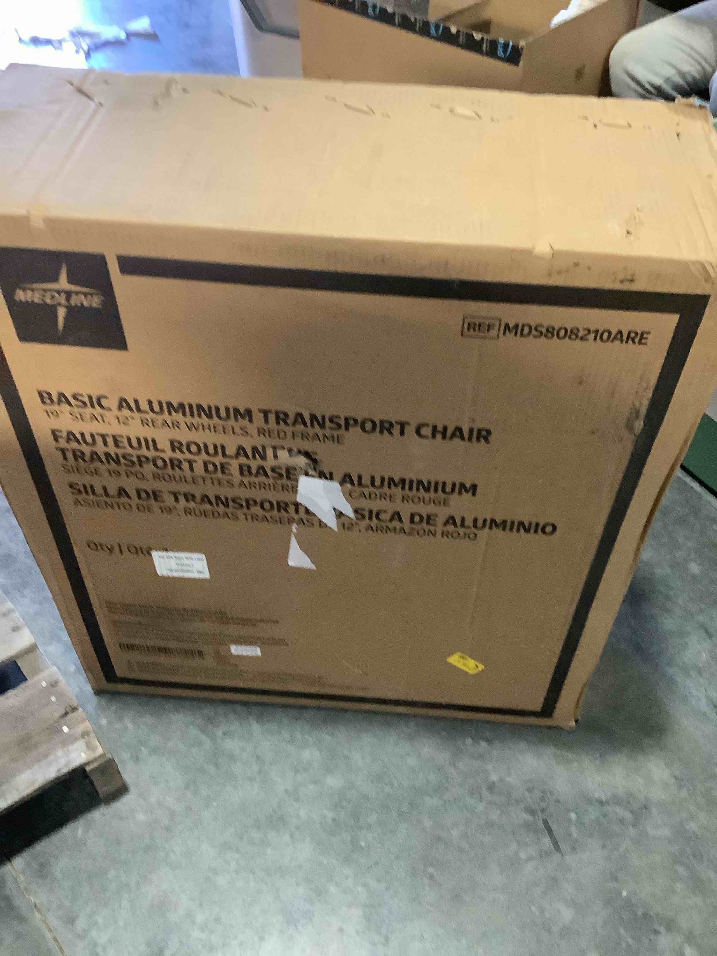 Condition photo showing New/Like New for Medline Lightweight Foldable Transport Wheelchair with Handbrakes and 12-Inch Wheels  Red Frame  Black Upholstery