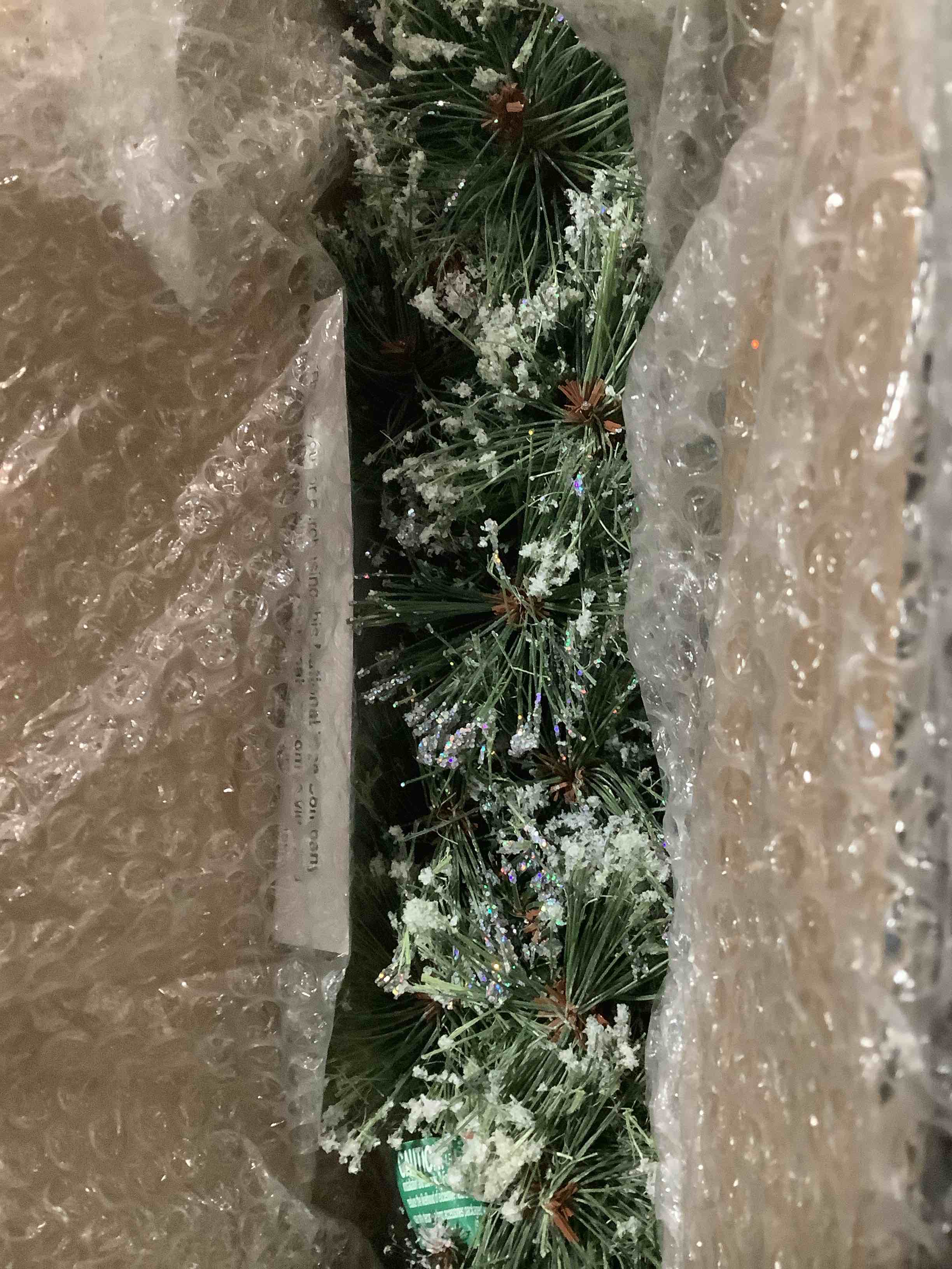 Condition photo showing Good Condition for National Tree Company Pre-Lit Artificial Christmas Garland, Green, Glittery Bristle Pine, White Lights, Decorated With Pine Cones, Frosted Branches, Plug In, Christmas Collection, 9 Feet