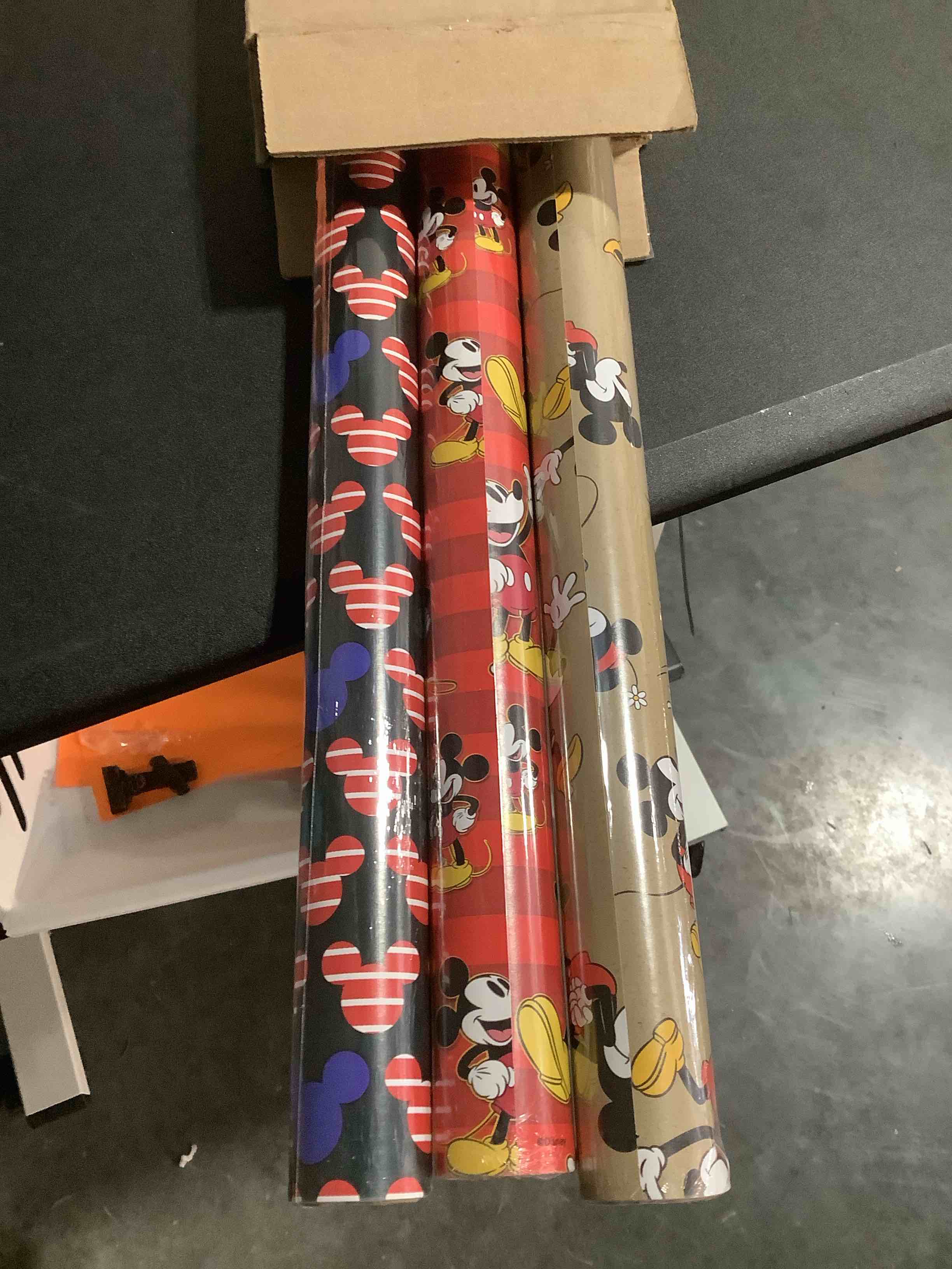 Condition photo showing Good Condition for Hallmark Disney Mickey Mouse Wrapping Paper with Cut Lines on Reverse (3-Pack: 60 sq. ft. ttl) for Birthdays, Christmas, Hanukkah, Baby Showers and More