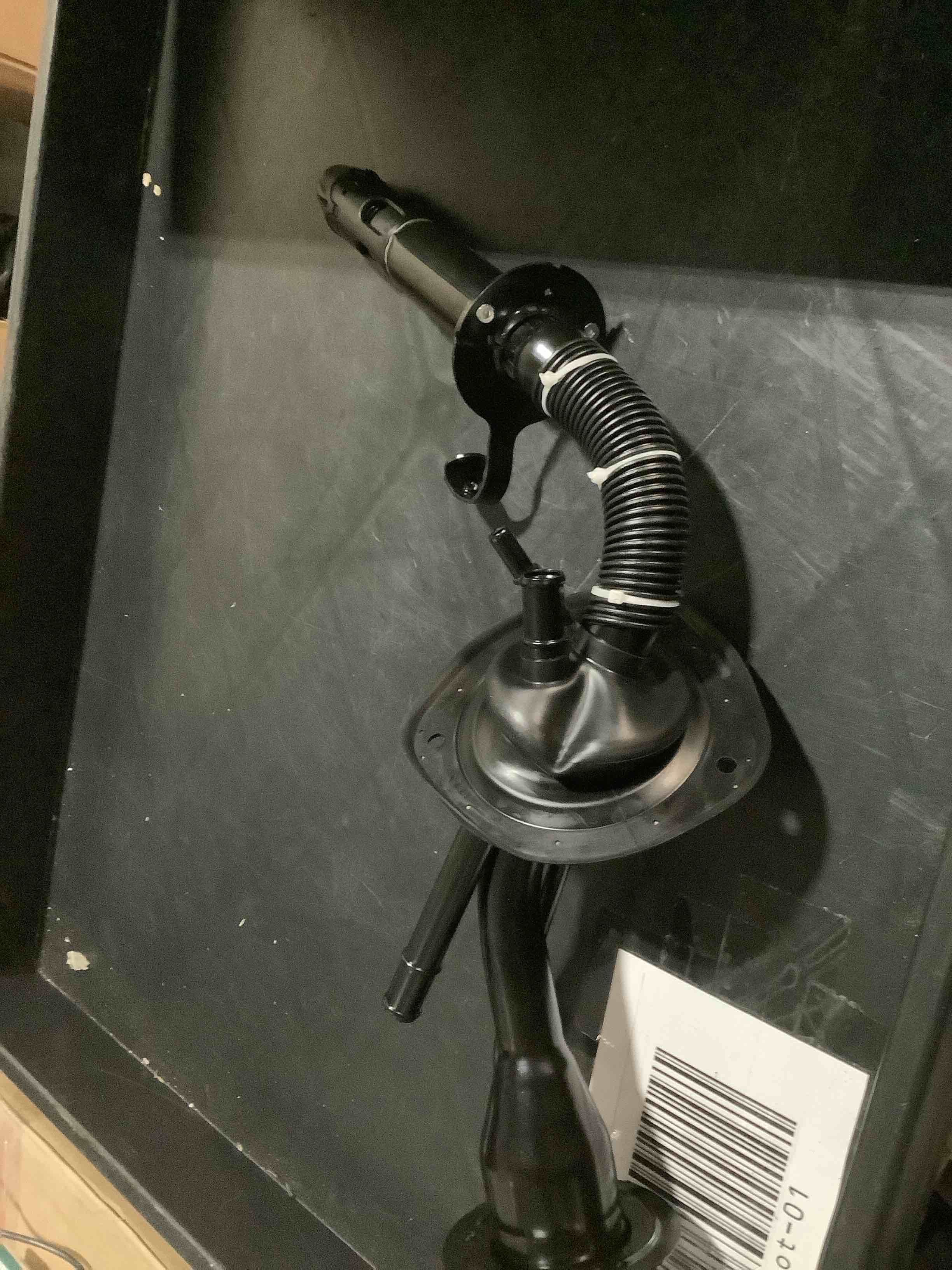 Condition photo showing As Is for Dorman 577-104 Fuel Filler Neck Compatible with Select Ford Models