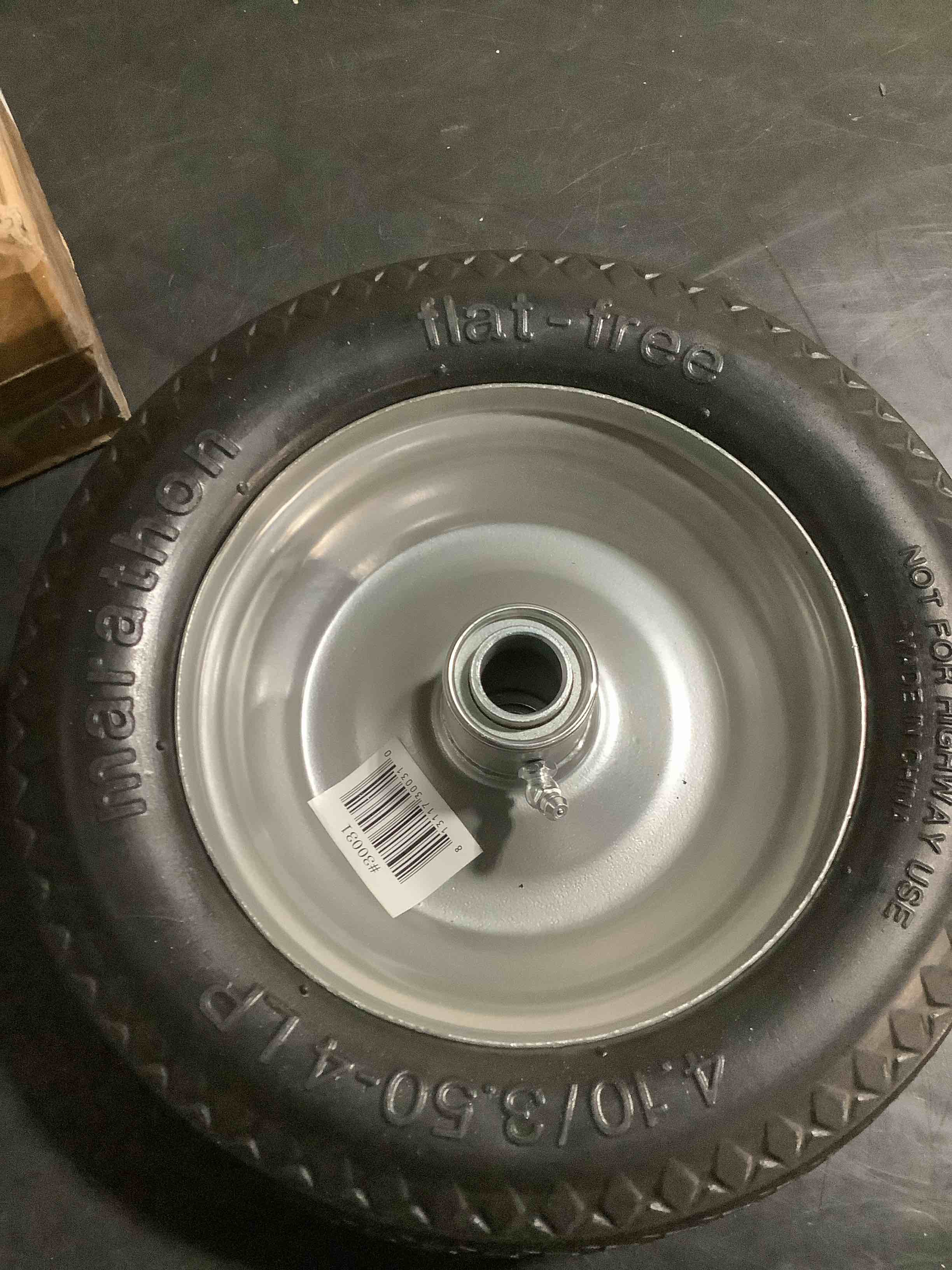 Condition photo showing Good Condition for Marathon 4.10/3.50-4" Flat Free, All Purpose Utility Tire on Wheel, 3.5" Centered Hub, 3/4" Bearings