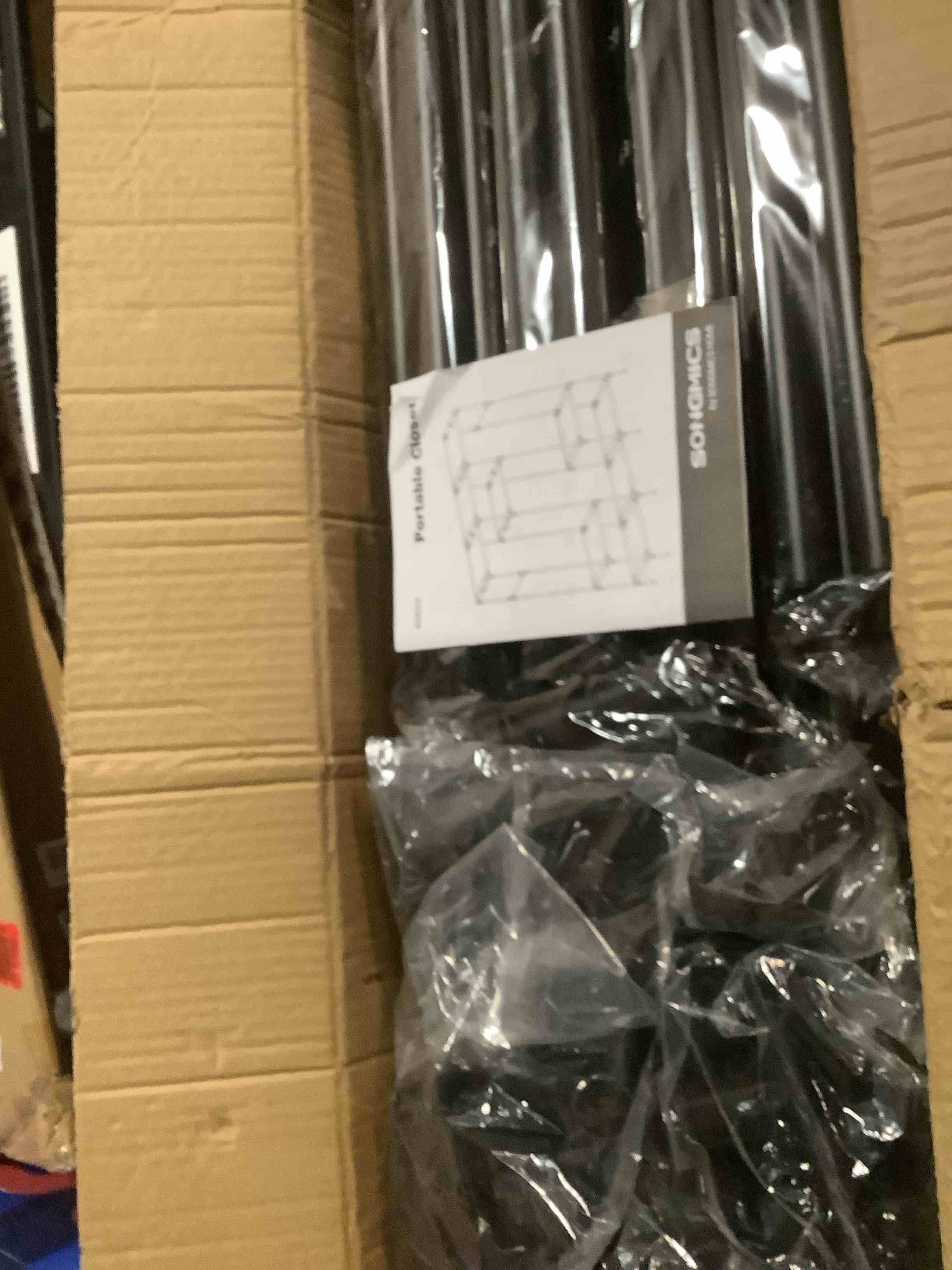 Condition photo showing As Is for SONGMICS Portable Closet, Freestanding Closet Organizer, Clothes Rack with Shelves, Hanging Rods, Storage Organizer, for Cloakroom, Bedroom, 59.5 x 16.9 x 65.4 Inches, Black URYG036B02 59.5"L x 16.9"W x 65.4"H Black