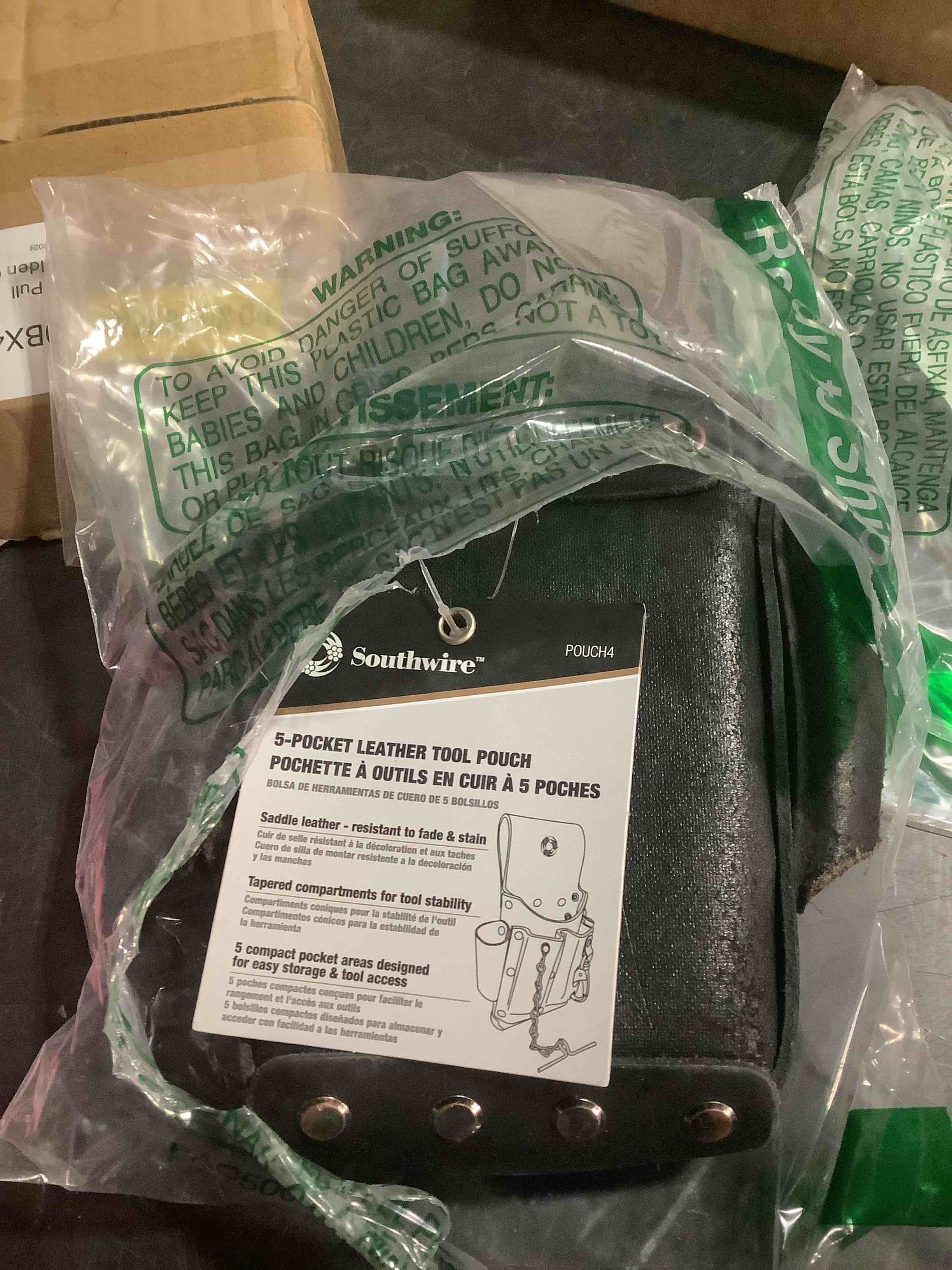 Condition photo showing Good Condition for Southwire POUCH4 Leather Tool Pouch; 5 Pocket Pouch with Electrical Tape Chain; Fade Resistant; Durable Compartments; Washer Rivets; Includes Metal Tool Clip; Dark Brown