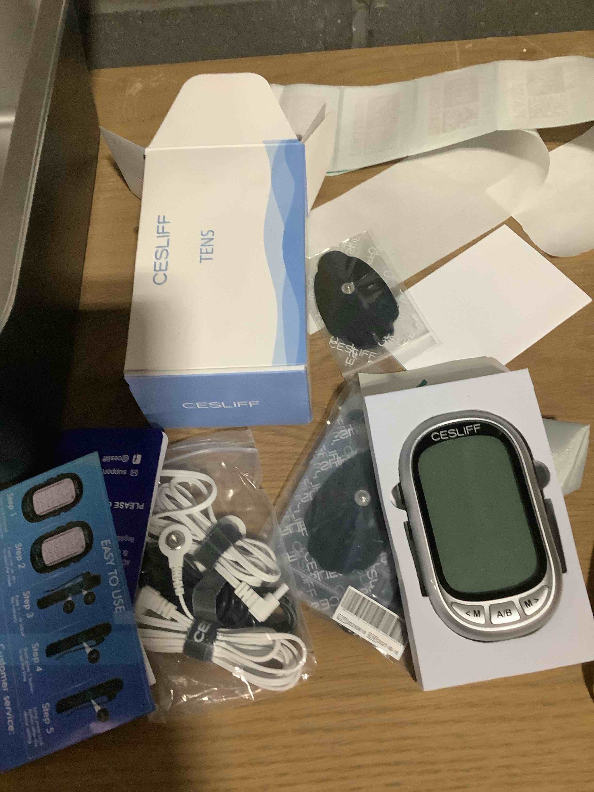 Condition photo showing Good Condition for Dual Channel TENS EMS Unit Large Screen 24 Modes 36 Levels Intensity Muscle Stimulator, Rechargeable Electric Pulse Massager TENS Machine for Lower Back Neck Shoulder Pain Relief with 10 Pads Silver