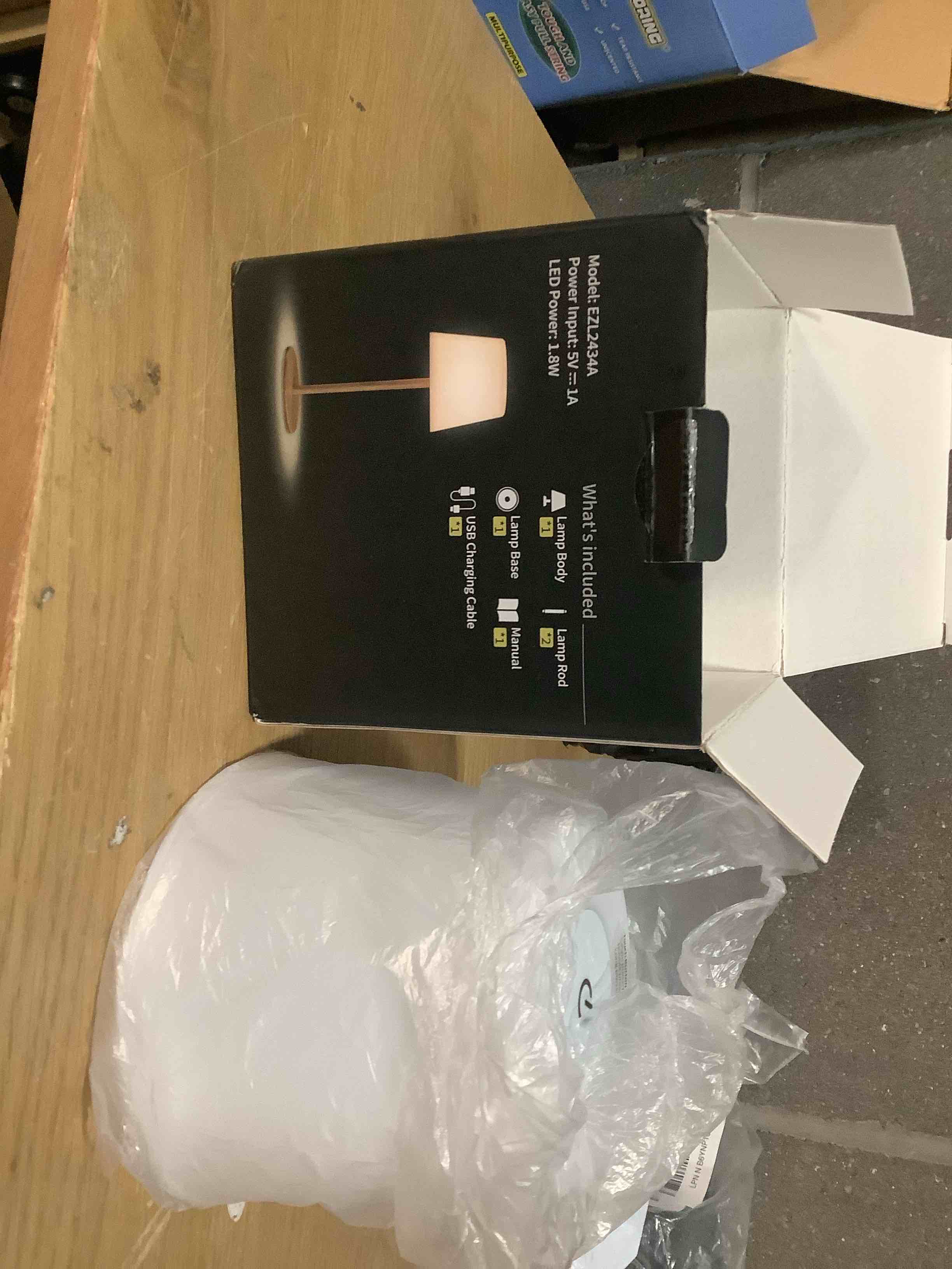 Condition photo showing Good Condition for EZVALO IP65 Waterproof Shower Table Lamp for Bathroom, Cordless Rechargeable Bath Light with 4500mAh Battery – Soft 360° Glow for Bathtub, Night Shower & Relaxing Routines Wood Grain 1 Pack