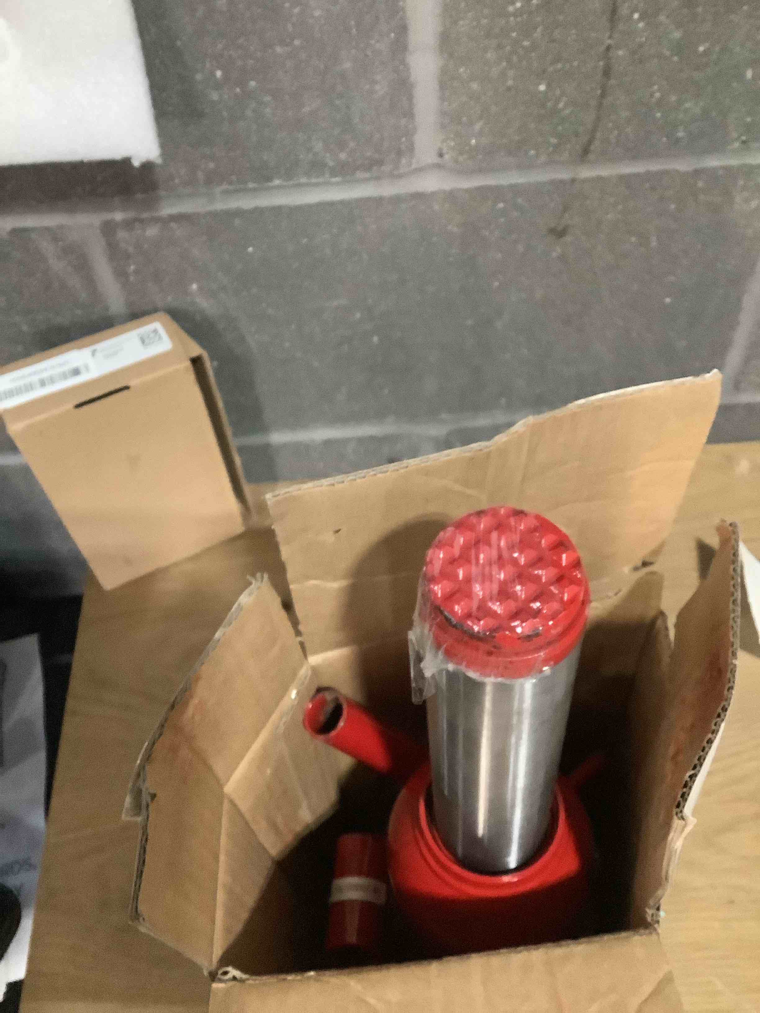 Condition photo showing As Is for BIG RED 12 Ton (24,000 LBs) Torin Welded Hydraulic Car Bottle Jack for Auto Repair and House Lift, Red, TAM91203B Bottle Jack 12 Ton (24,000 LBs) Red