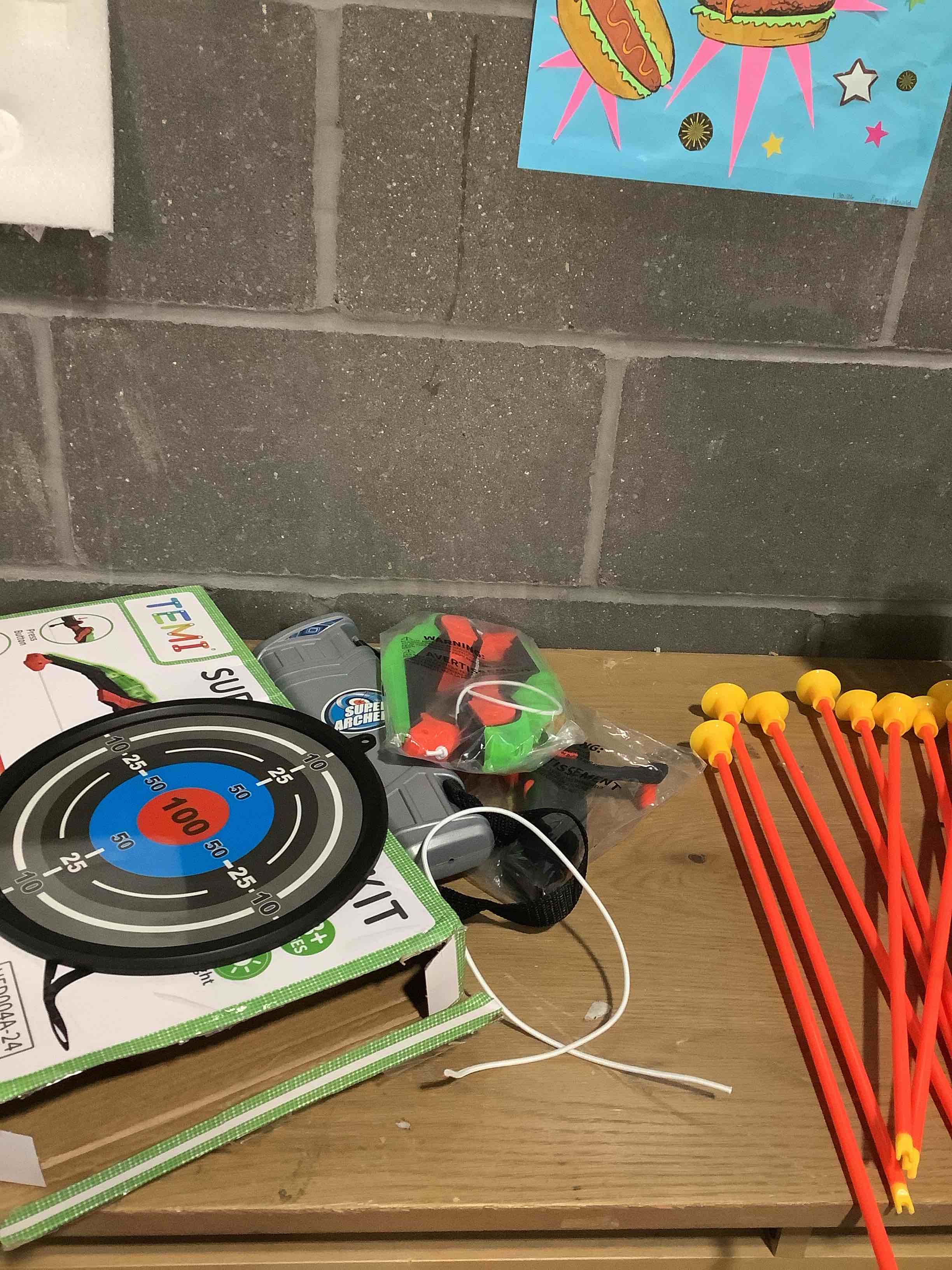 Condition photo showing Good Condition for TEMI Bow and Arrow Set for Kids - Archery Toy Set - LED Light Up with Suction Cup Arrows, Target & Quiver, Indoor and Outdoor Toys for Children Boys Girls Green