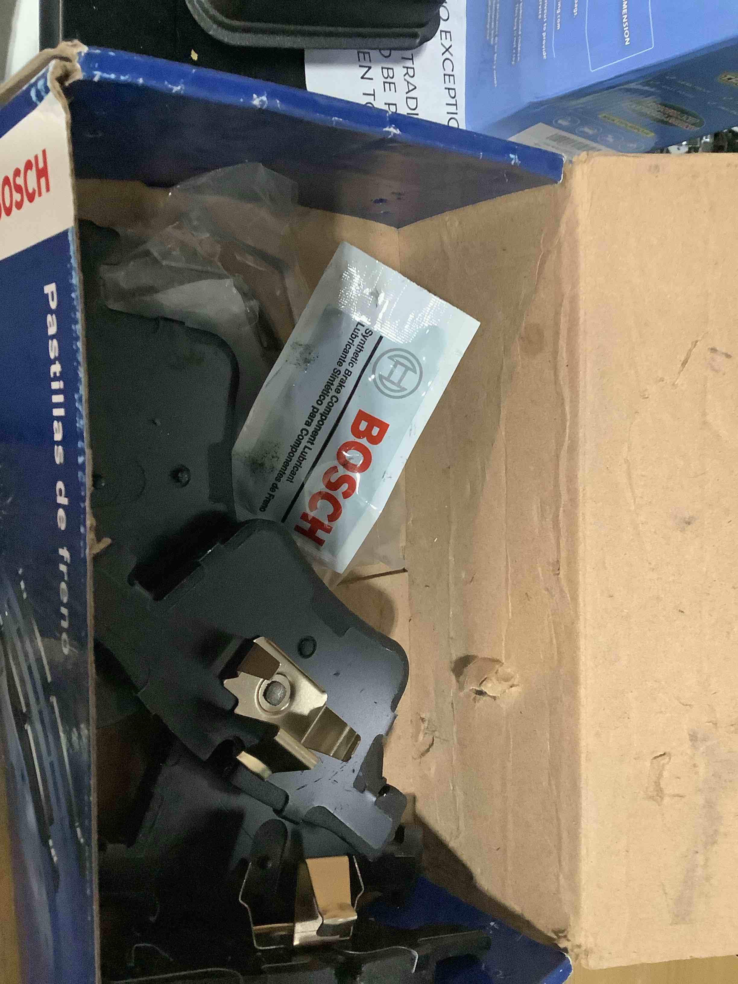 Condition photo showing As Is for BOSCH BE1561H Blue Semi-Metallic Ceramic Disc Brake Pad Set With Hardware - Compatible With Select BMW 228i, 230i, 320i, 328d, 328i, 330e, 330i, 428i, 430i, X3, X4, Gran Coupe, GT, xDrive; FRONT