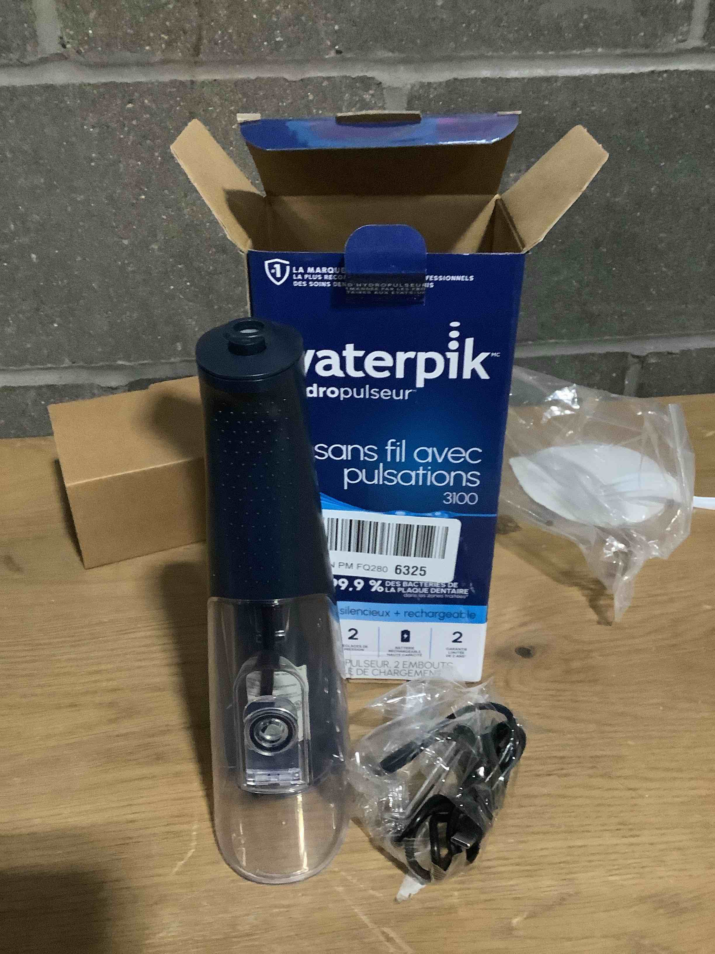 Condition photo showing Good Condition for Waterpik Cordless Pulse Rechargeable Portable Water Flosser for Teeth, Gums, Braces Care and Travel with 2 Flossing Tips, Waterproof for Shower, ADA Accepted, WF-20 Blue, Packaging and Tips May Vary