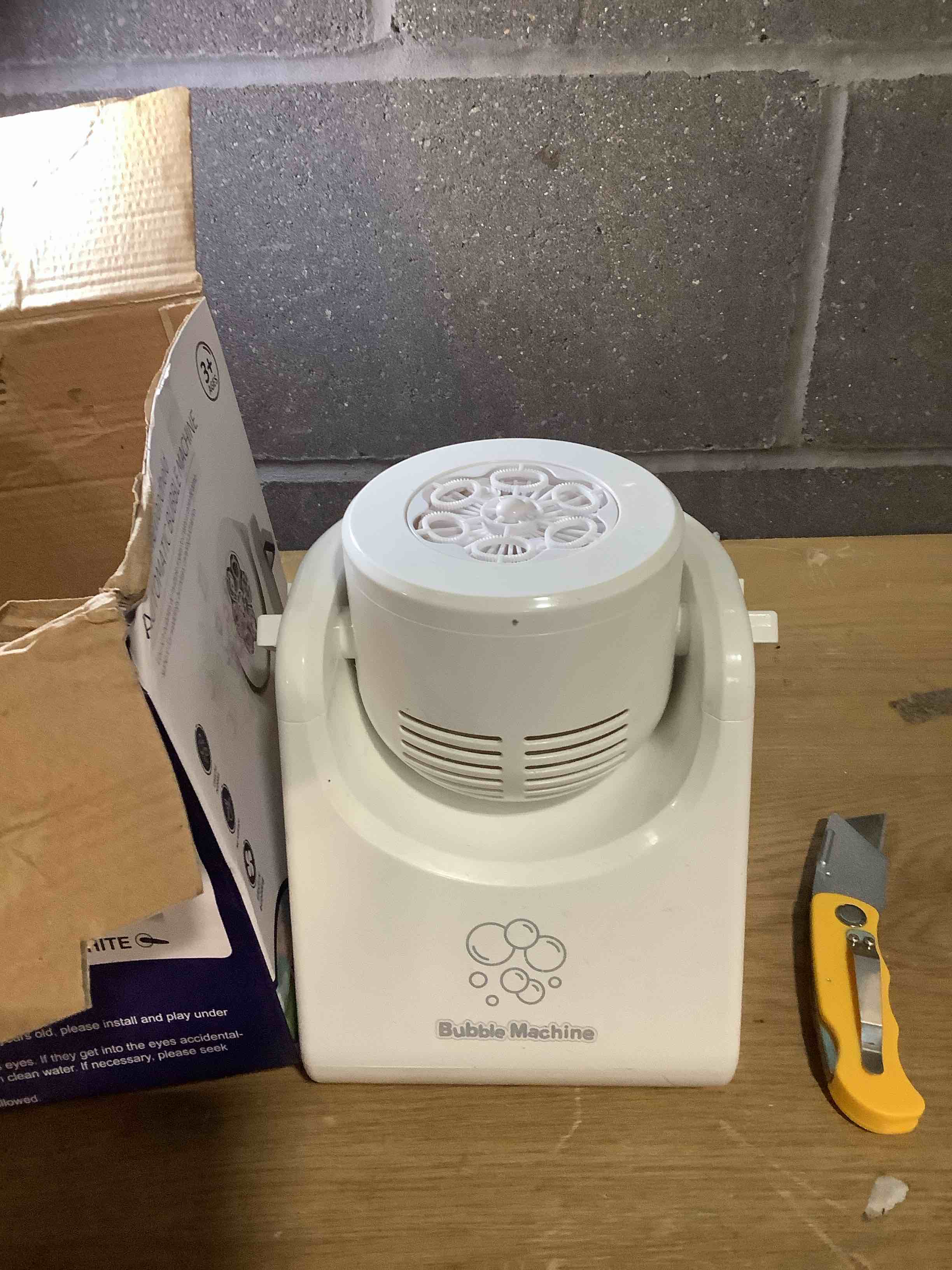 Condition photo showing As Is for Bubble Machine for Kids Toddlers,Automatic Bubble Blower,Portable Adjustable Angle Bubble Maker,Bubbles Toy for 3 4 5 6 7 Year Old Boy Girl,Outdoor Party Birthday Easter Baskets Stuffers Gifts Handheld White