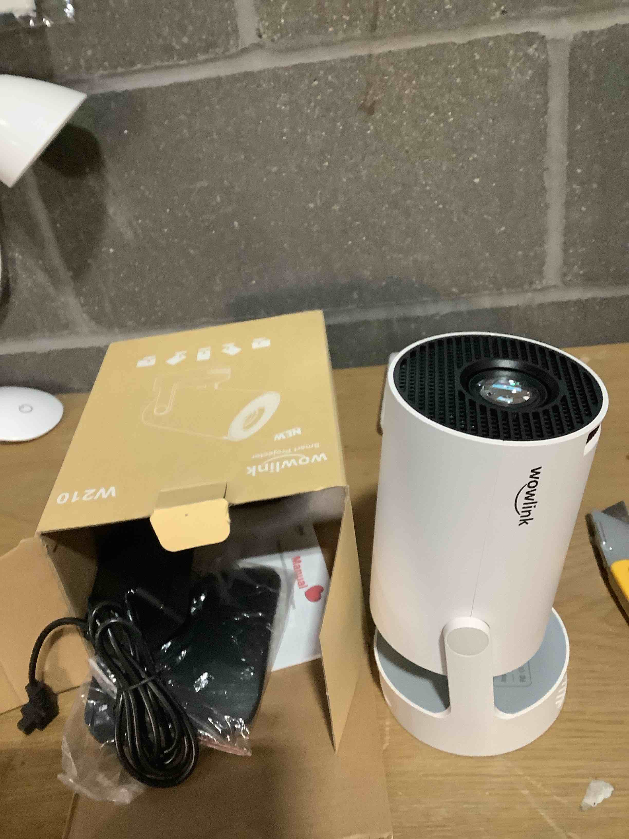 Condition photo showing Good Condition for [Built-in Apps & 2026 Upgraded] Mini Projector with WiFi 6 and Bluetooth 5.4 Support 4K 1080P Auto Keystone 180° Rotatable Projector Portable Compatibile with HDMI/TV Stick/Memory Stick/Laptop, White