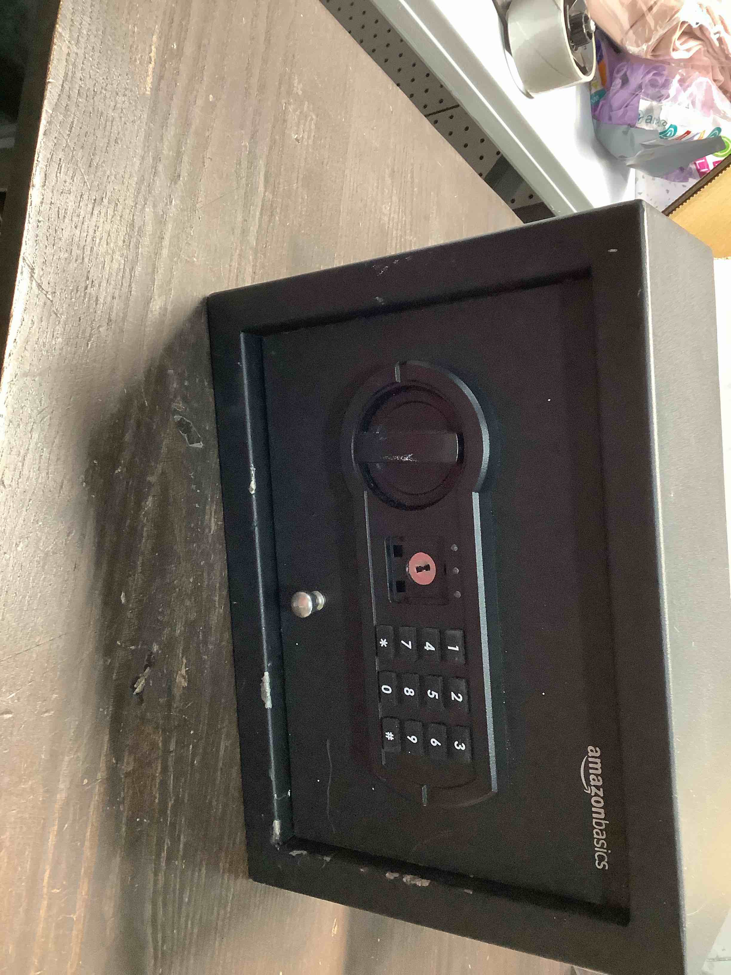 Condition photo showing As Is for Amazon Basics Small Slim Desk Drawer Security Safe with Programmable Electronic Keypad, 0.1 Cubic Feet, Small Safe, Black, 11.8''W x 8.6''D x 4.4''H