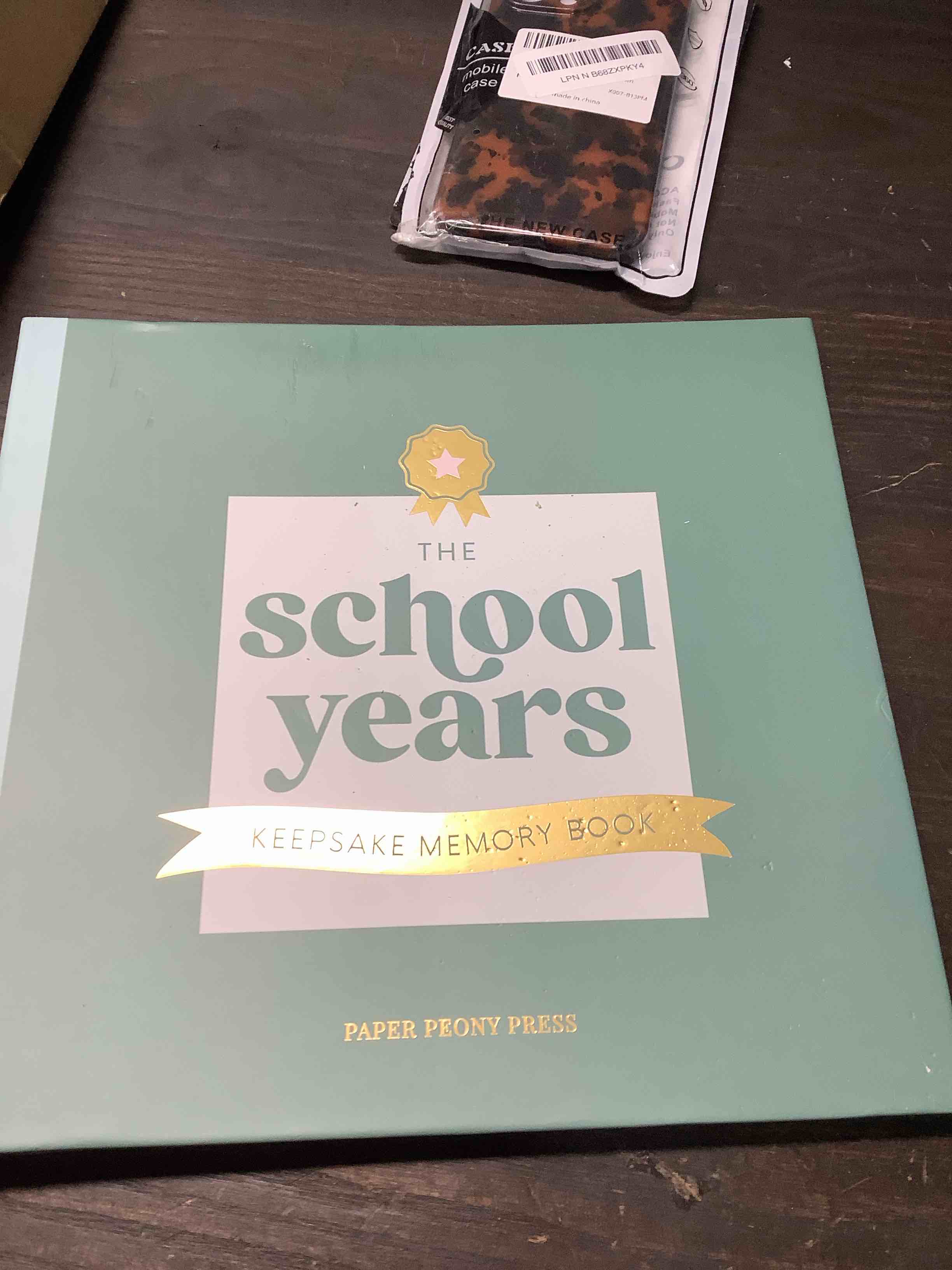 Condition photo showing Good Condition for The School Memory Book: A Timeless School Years Memory Book for Preschool - 12th Grade Memories, Keepsakes and Cherished Moments (Storage Pocket Included)