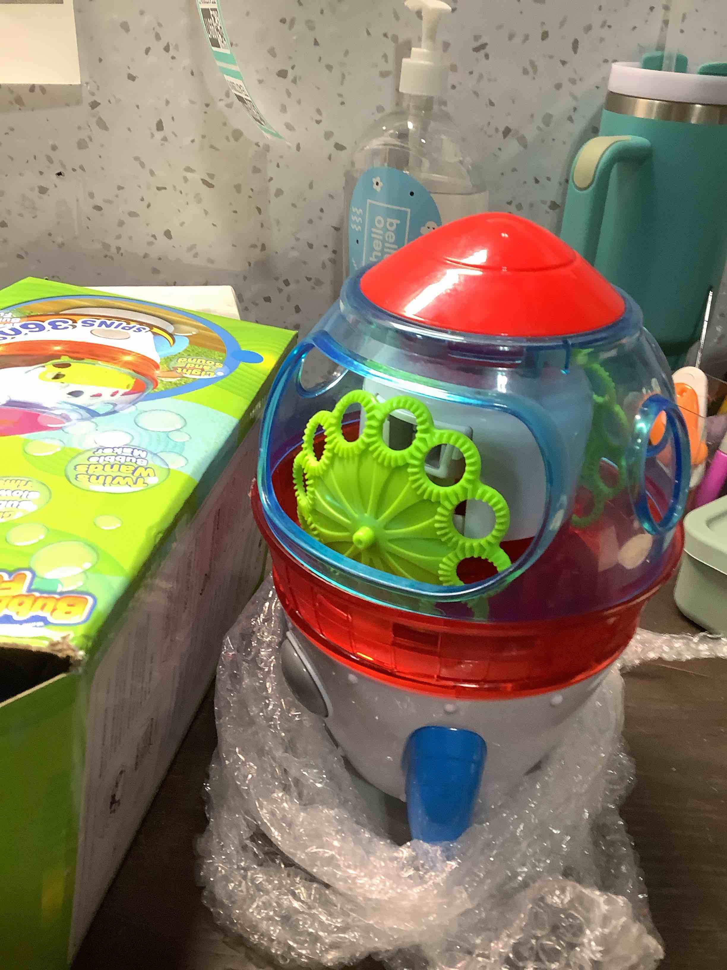 Condition photo showing As Is for Rocket-Shaped Bubble Machine for Kids & Pets - Dual Powerful Bubble Outlets, Automatic 360° Rotation, Adjustable LED Lights & Music – Ideal for Indoor/Outdoor Birthday Parties