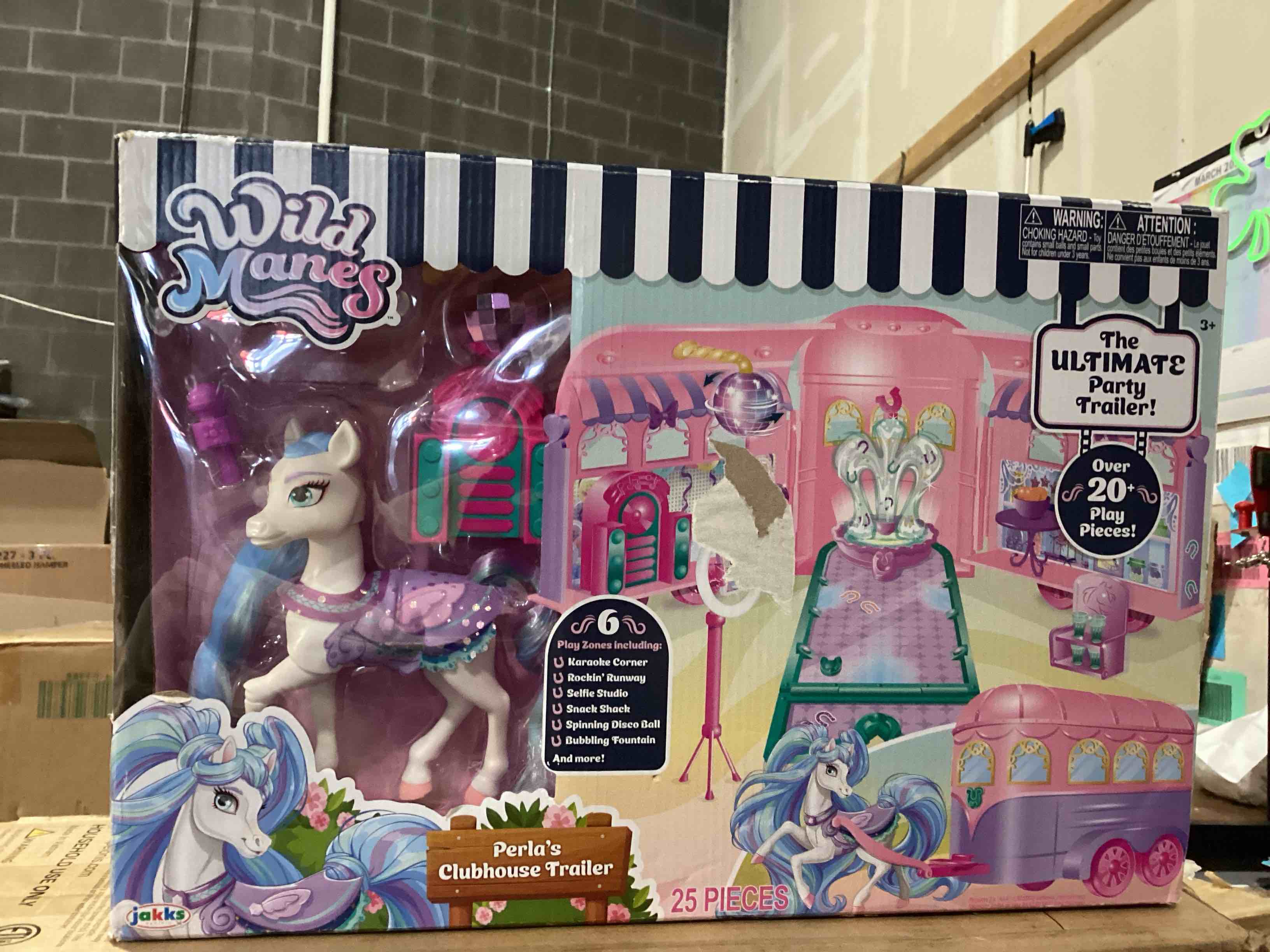 Condition photo showing New/Like New for Wild Manes Perla’s Pink Ultimate Clubhouse Runway Trailer Interactive Playset