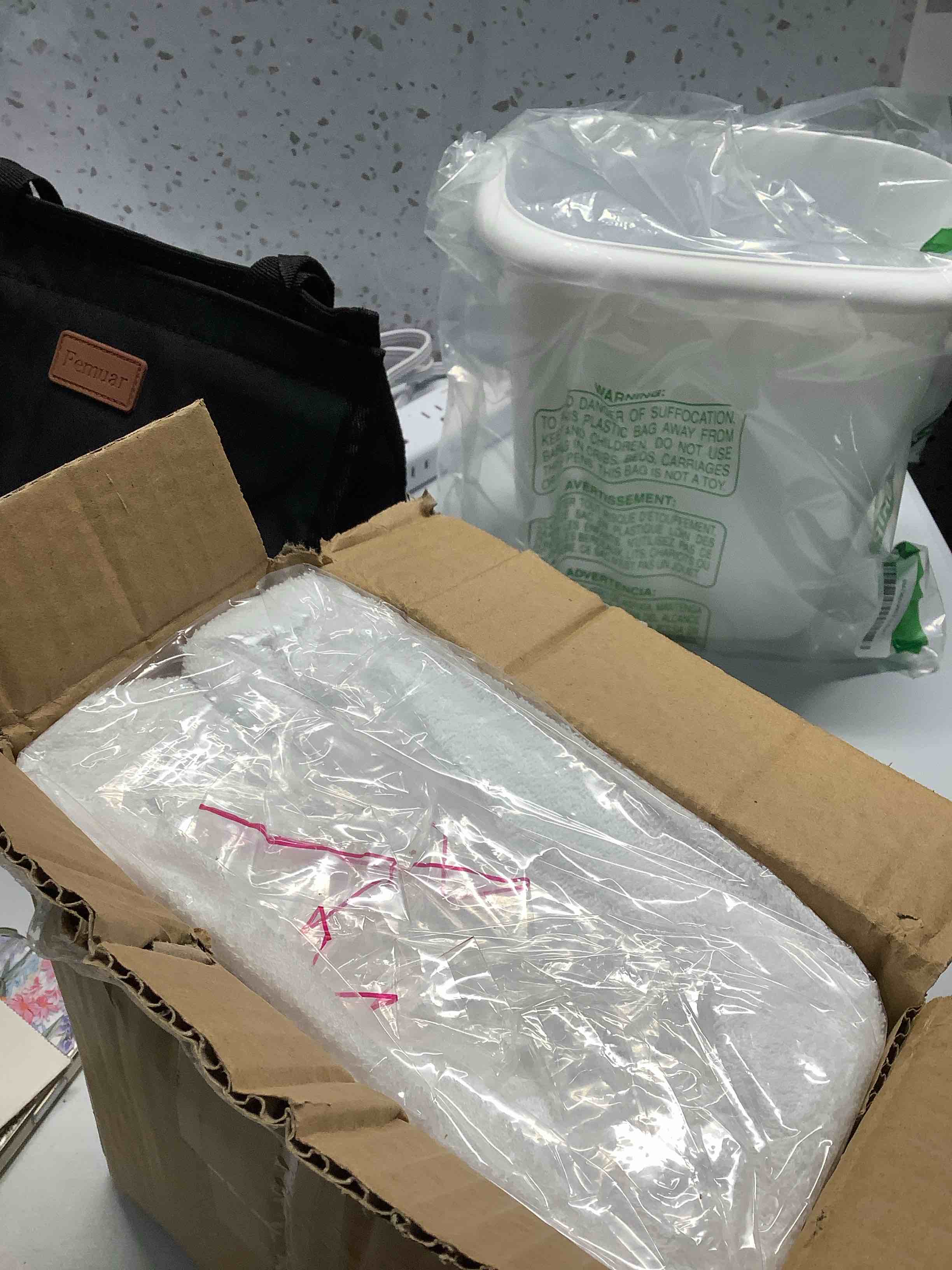 Condition photo showing Good Condition for Amazon Basics Waterproof 18 inch Mattress Protector King Size, Breathable, Machine Washable, White