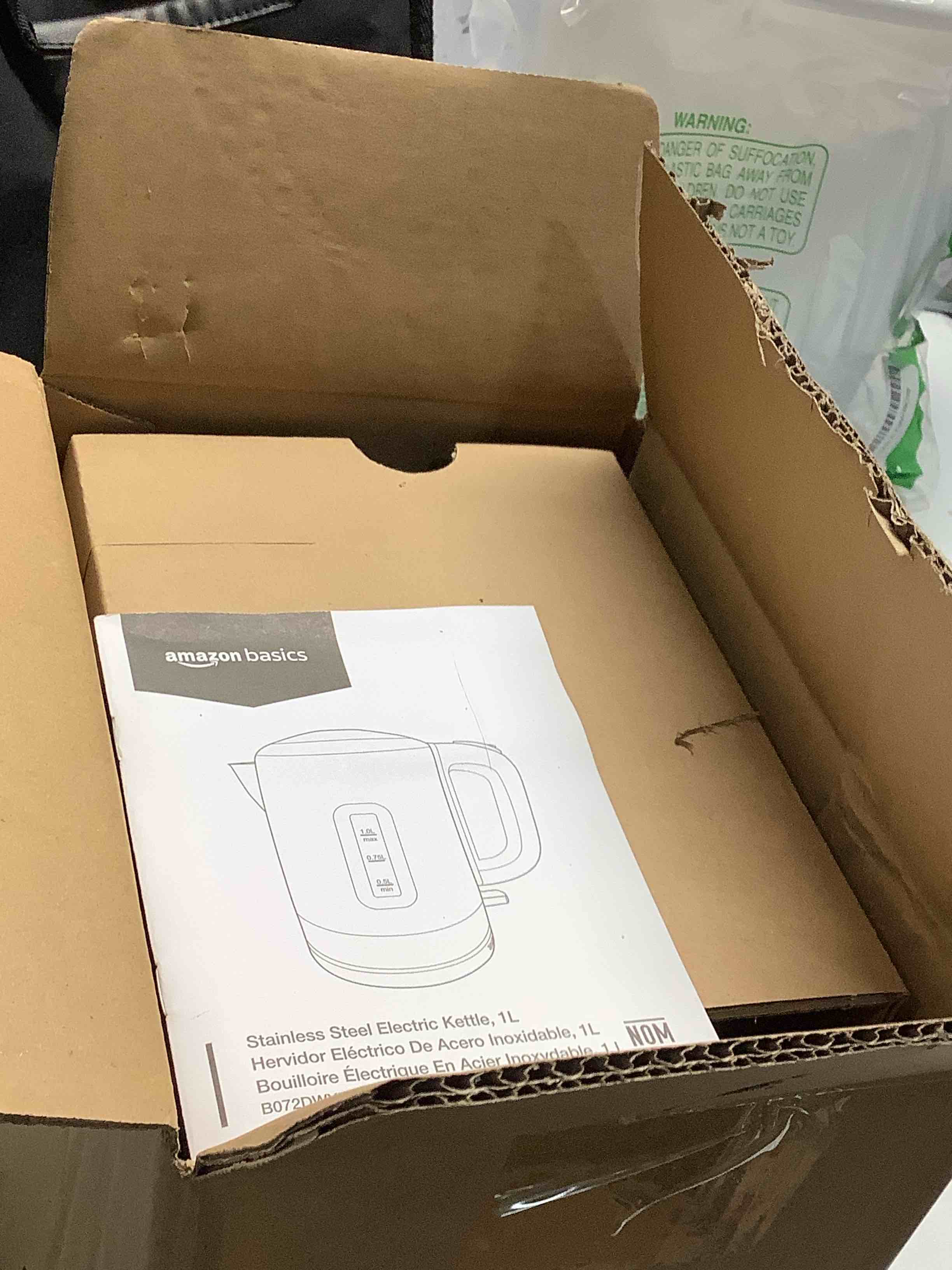 Condition photo showing Good Condition for Amazon Basics 1.1Qt (1L) Electric Kettle, Tea Kettle & Water Boiler, with Auto Shut-Off, Boil Dry Protection, High-Safety Strix Thermostat, BPA-Free, 1500W, Stainless Steel, New Model, Black & Silver