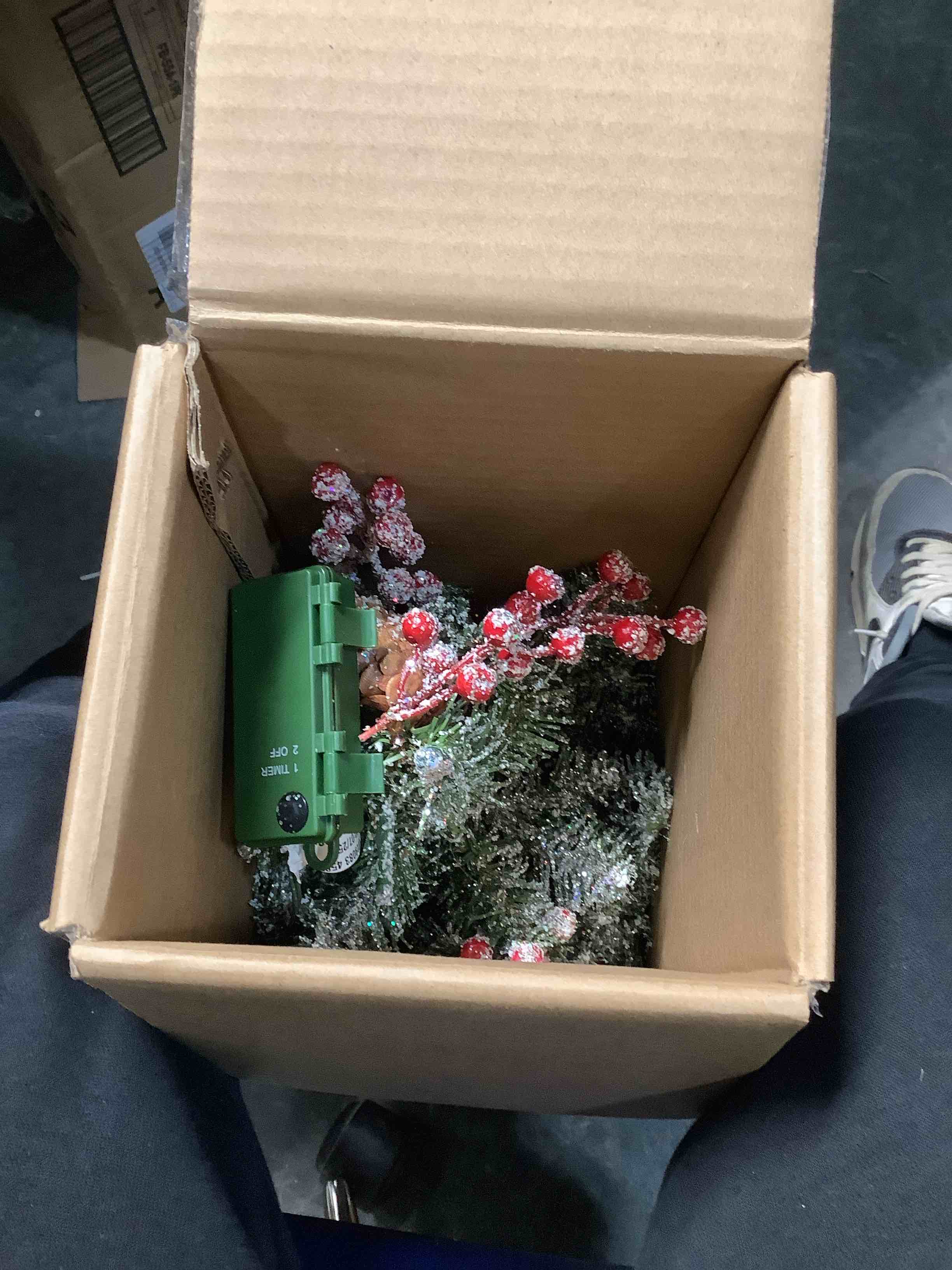 Condition photo showing Good Condition for National Tree Company 2 ft Pre-Lit Flocked Dunhill Fir Mini Artificial Christmas Tree, 15 Clear LED Lights, 75 Tips, Pinecones, Red Berries, Timer, Burlap Base, Green