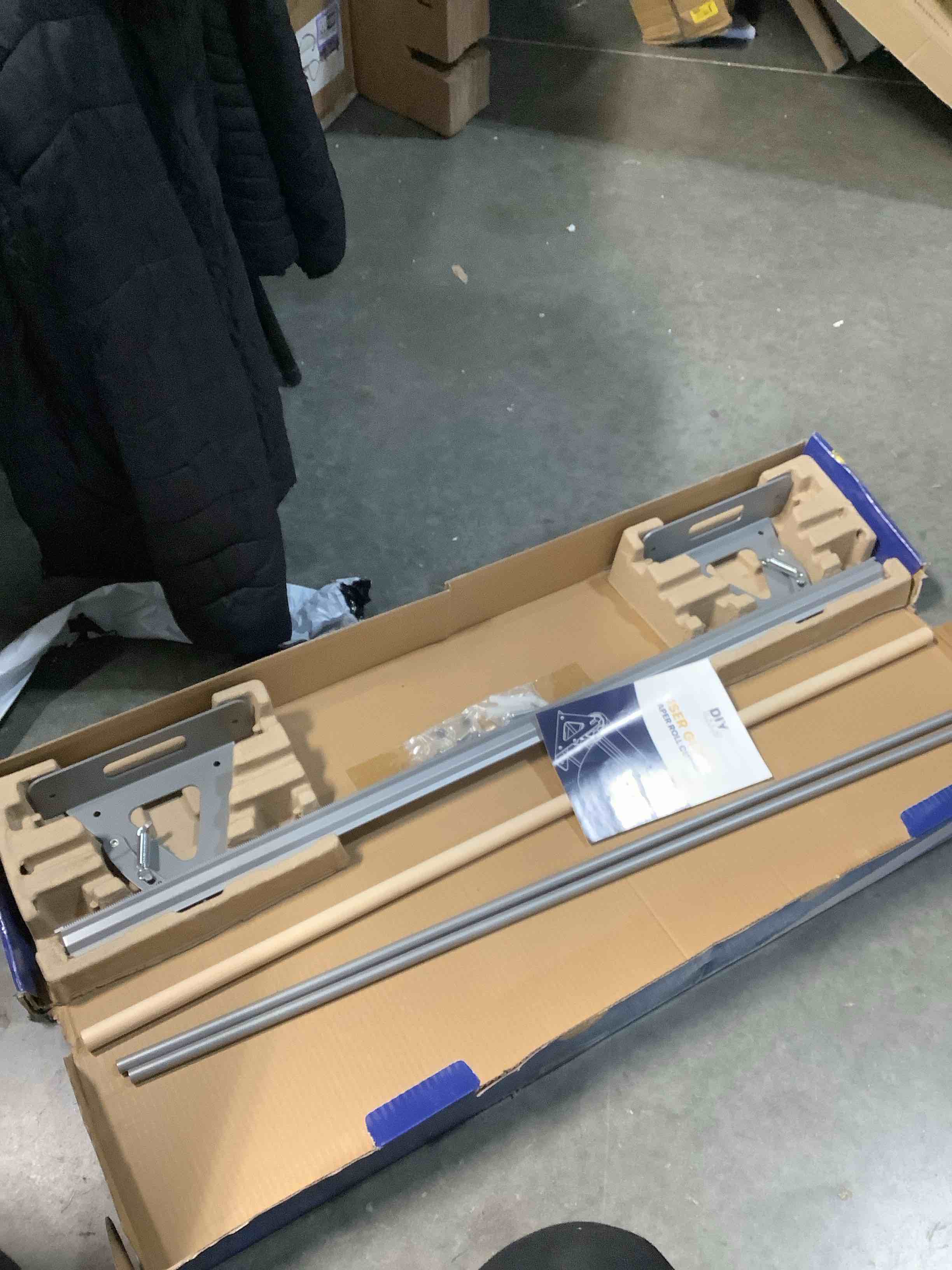 Condition photo showing As Is for DIY Crew 36 Inch Paper Roll Dispenser and Cutter - Heavy-Duty Wall Mountable, Non Slip Tabletop - Kraft, Freezer, Butcher Paper - Up to 1000ft Rolls 36" Silver