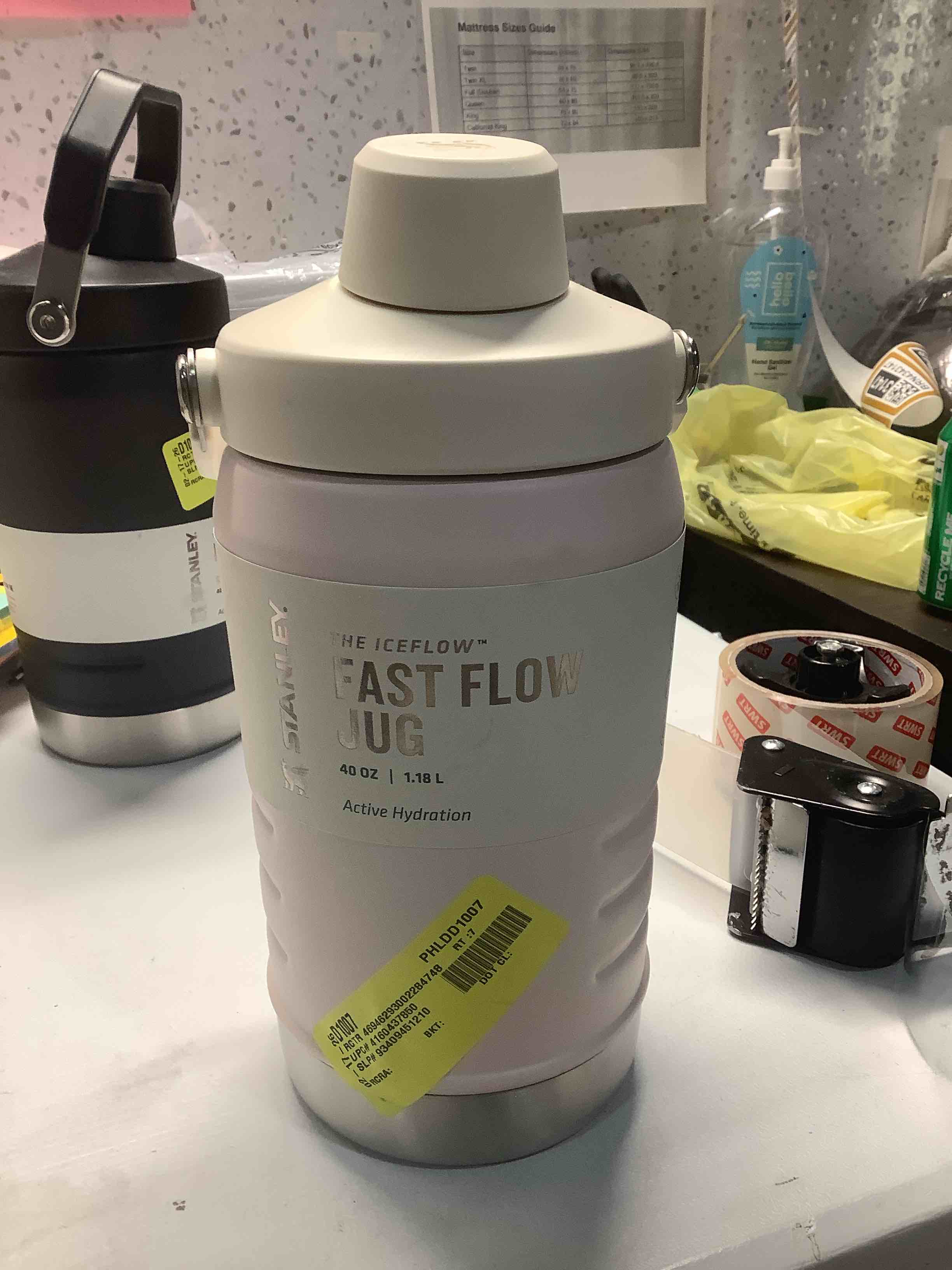 Condition photo showing Good Condition for Stanley IceFlow Fast Flow Jug with Handle 96 oz | Twist On Angled Spout Lid | Leakproof for Travel and Sports | Insulated Stainless Steel | BPA-Free | Rose Quartz