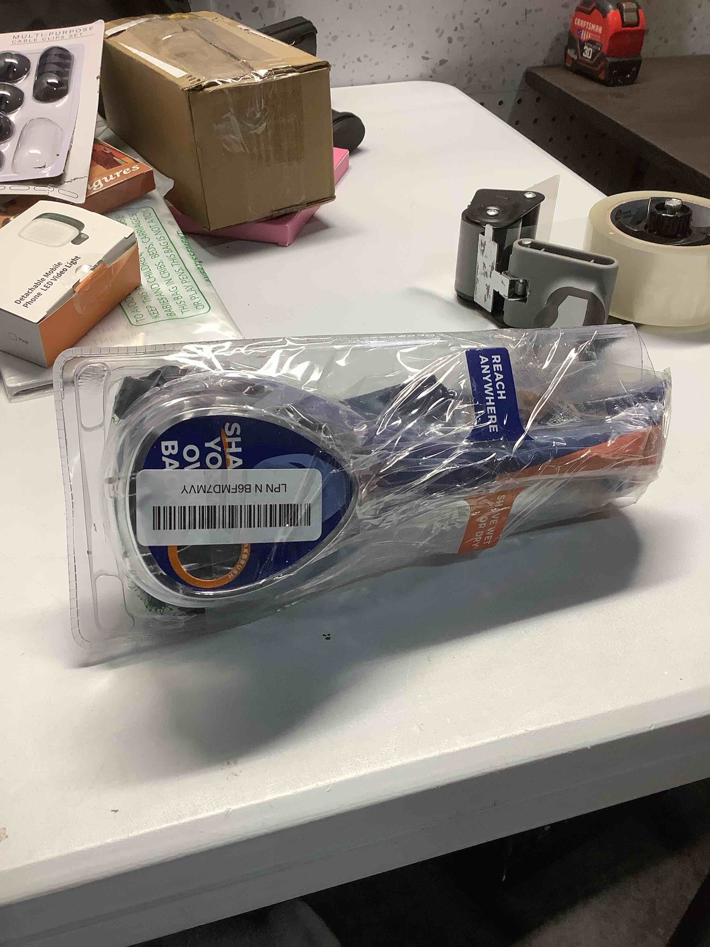 Condition photo showing Good Condition for BAKblade 2.0/ELITE PLUS - Back Hair Removal and Body Shaver (DIY), Easy to Use Ergonomic Handle for a Close, Pain-Free Shave, 3 of the Wet or Dry Disposable Razor Blades, Scrubbing Sleeve Included bakblade 2.0 ELITE PLUS