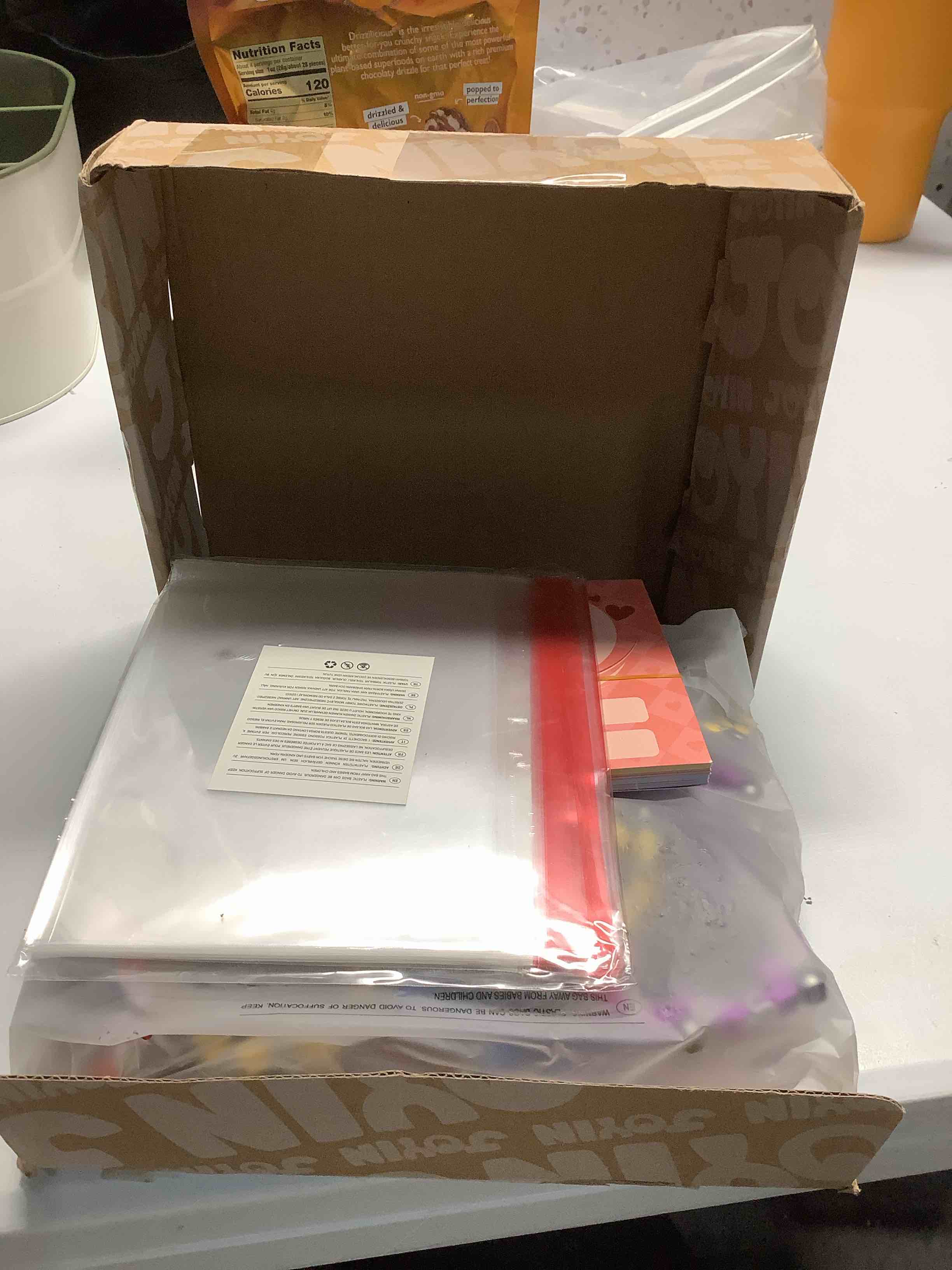 Condition photo showing Good Condition for JOYIN 28 Packs Valentine’s Day 4-Design Gift Cards with Fidget Spinners, DIY Chain Robot Fingertip Toys, Deformable Stress Relief Toys for Kids Valentine’s Party Favor, School Exchange, Game Prizes