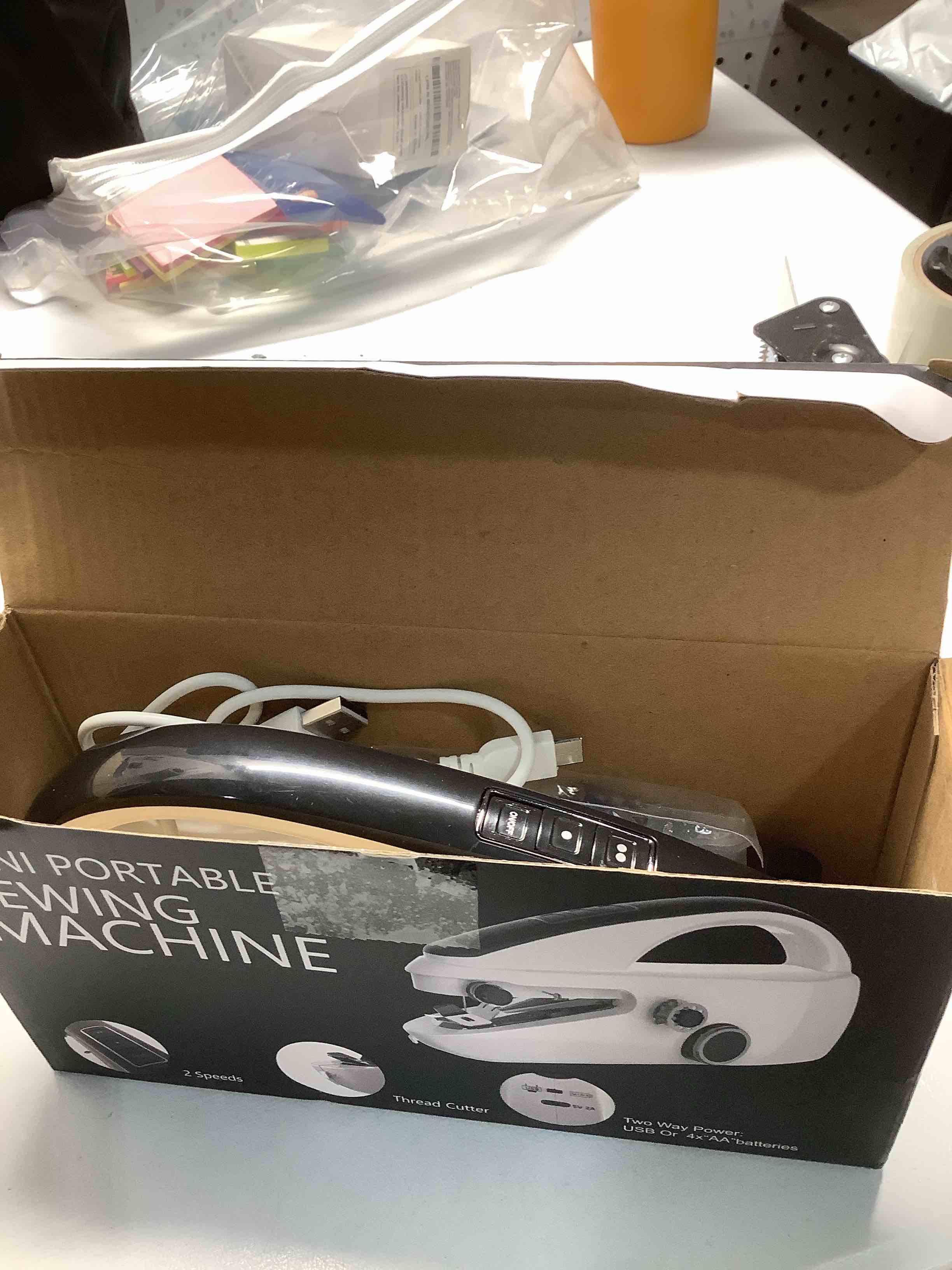 Condition photo showing Good Condition for Handheld Sewing Machine,Portable,Mini Sewing Machine,Easy to Use,Fast Sewing Speed,Suitable for Sewing Clothes,Fabric,DIY Home Machine for Beginners.Black