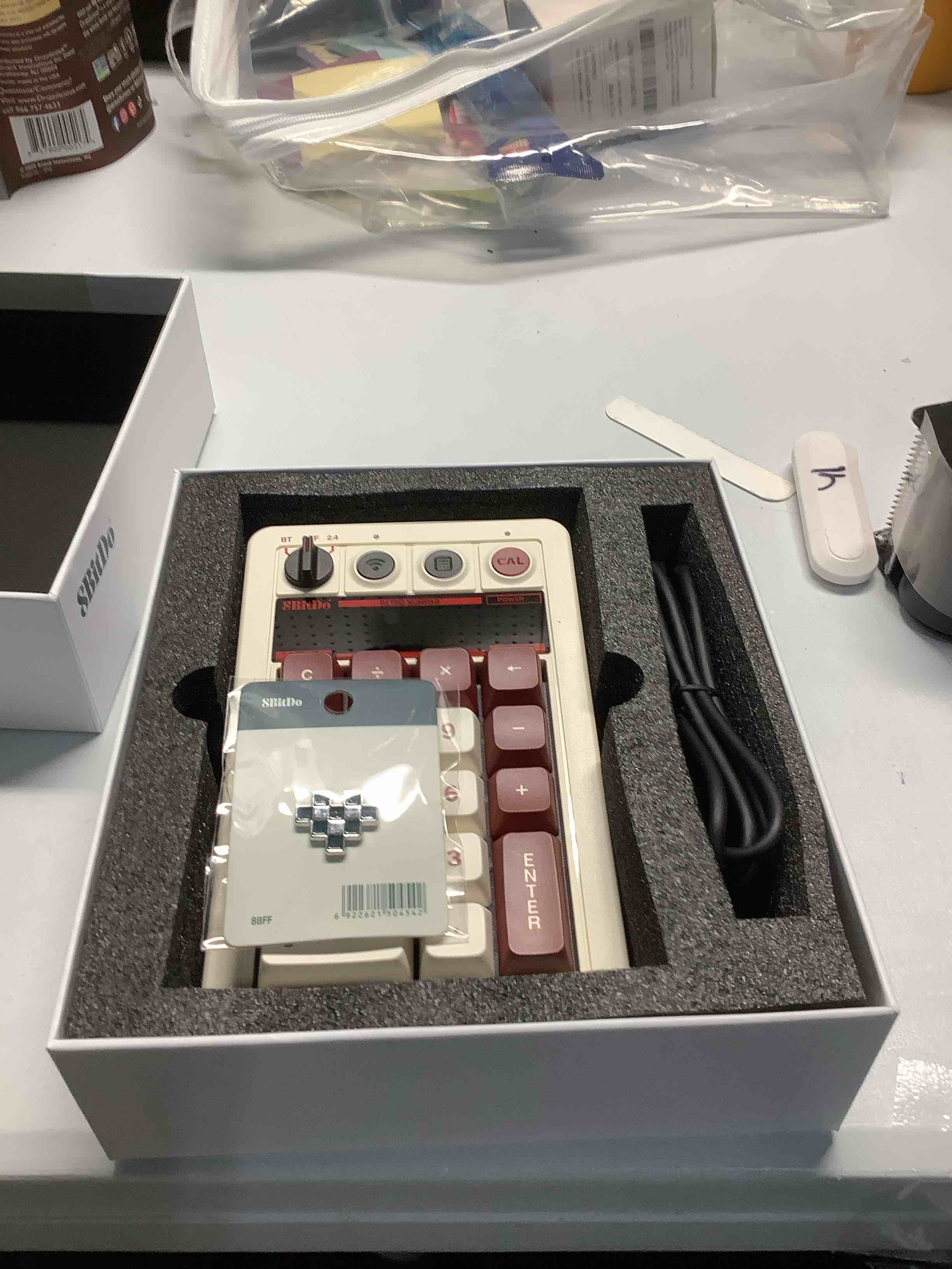 Condition photo showing Good Condition for 8Bitdo 18 Keys Retro Mechanical Numpad, Supports PC Numpad & Standard Calculator Mode, Hot-swappable, PC Calculator Shortcut Button, Bluetooth/2.4G/Wired Numpad for Windows and Android - Fami Edition